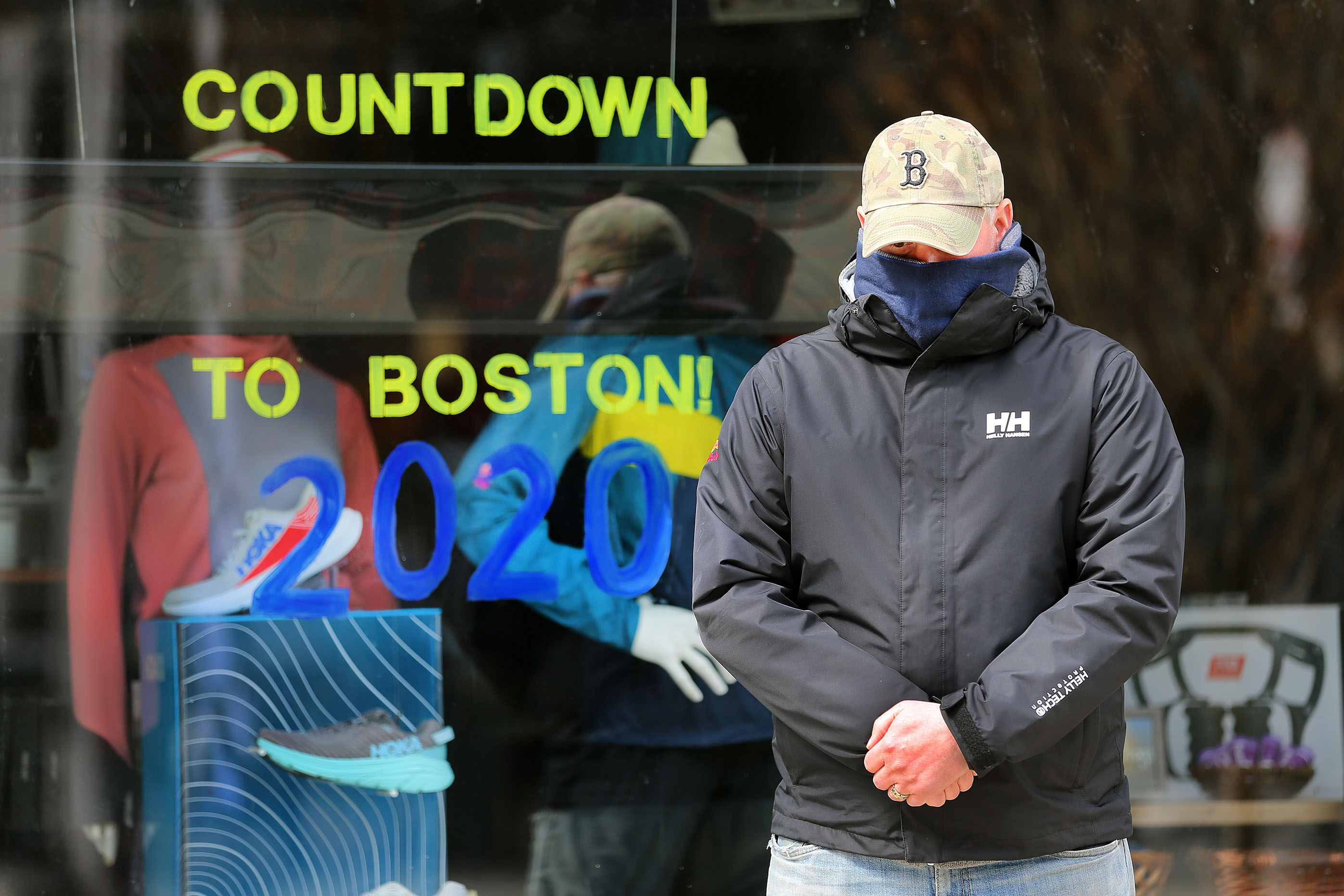 The church bells at the Old South Church rang for five minutes at 2:49 p.m., the time of the first bombing in 2013, as Matt Smith paused in front of Marathon Sports near the finish line. He helped save the life of bombing survivor Sydney Corcoran in front of the shop in 2013.