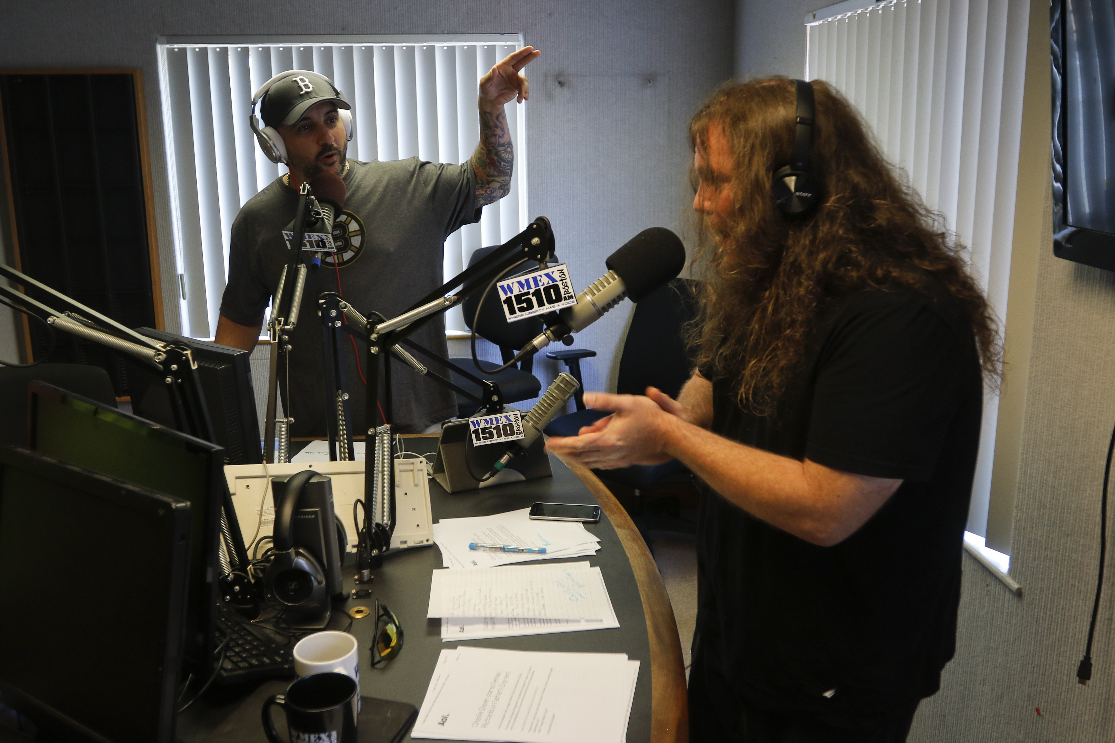 John Picka and Bryan Berner, new talk-show hosts at 1510 WMEX-AM, were on the air during their 1:30 segment Monday at the station’s Quincy studio.