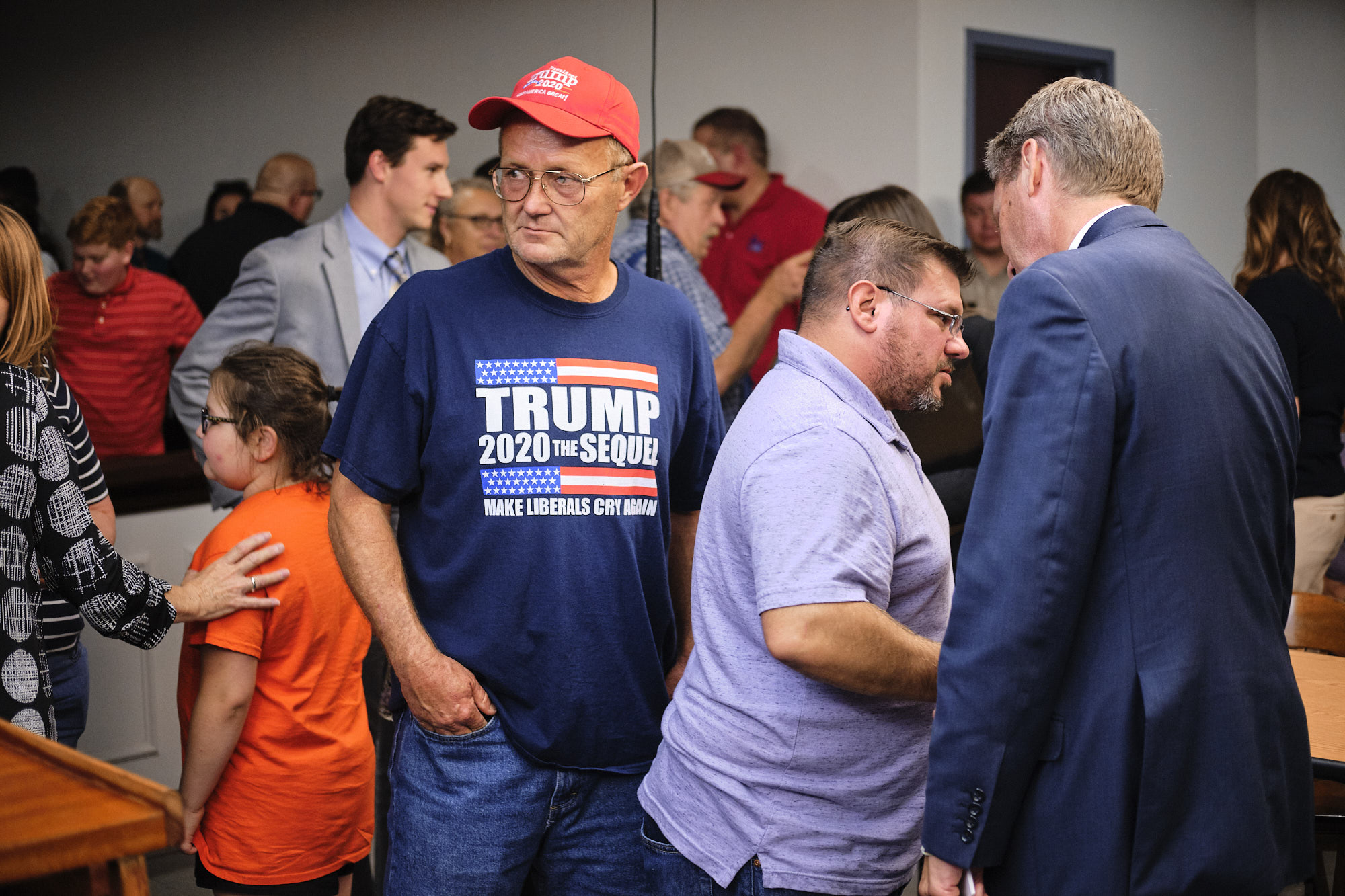 Attendees chatted with Representative Tim Burchett after a town hall meeting in Rutledge, Tenn.