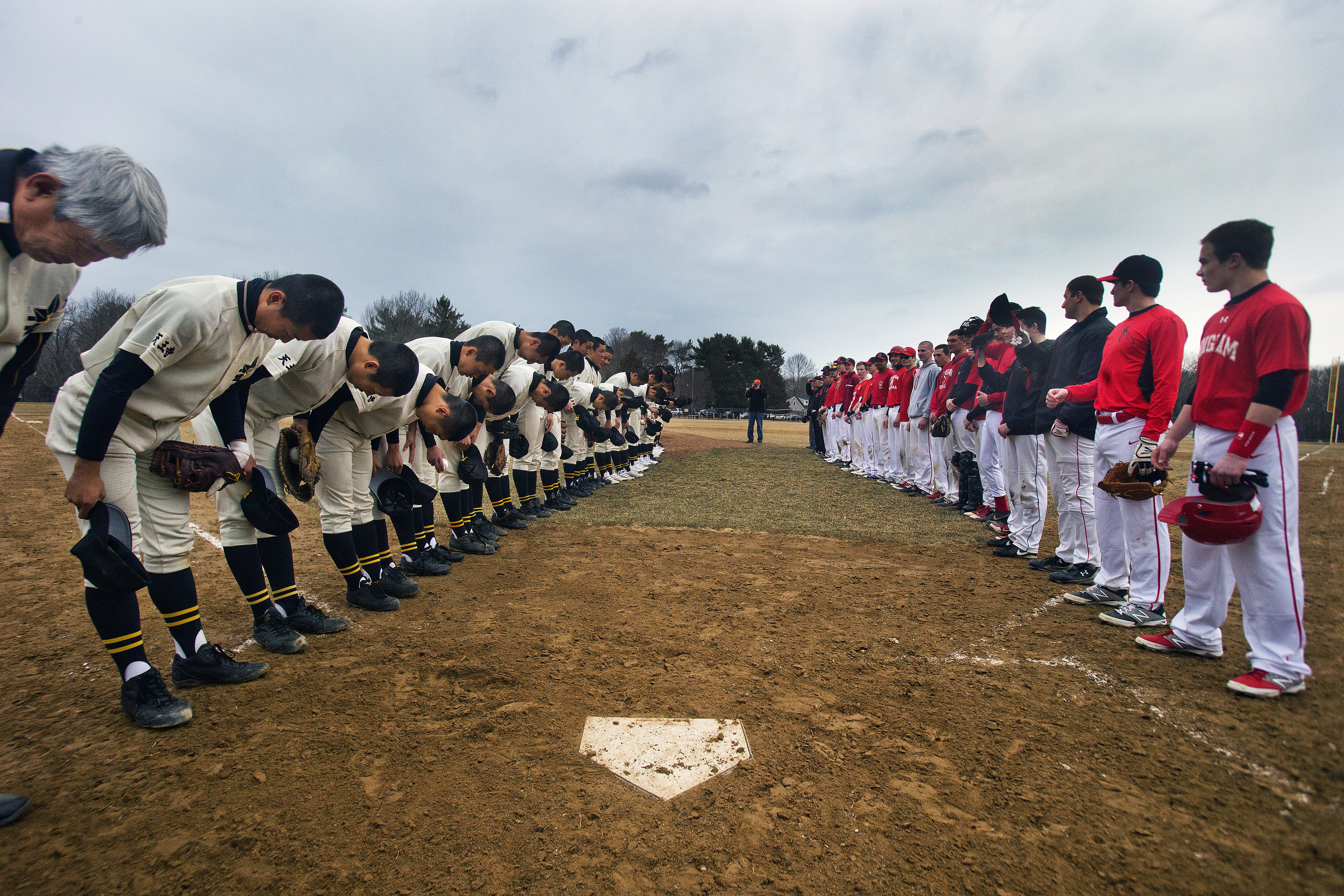 Members of the Tennoji team bowed to their opponents before the teams’ scrimmage.