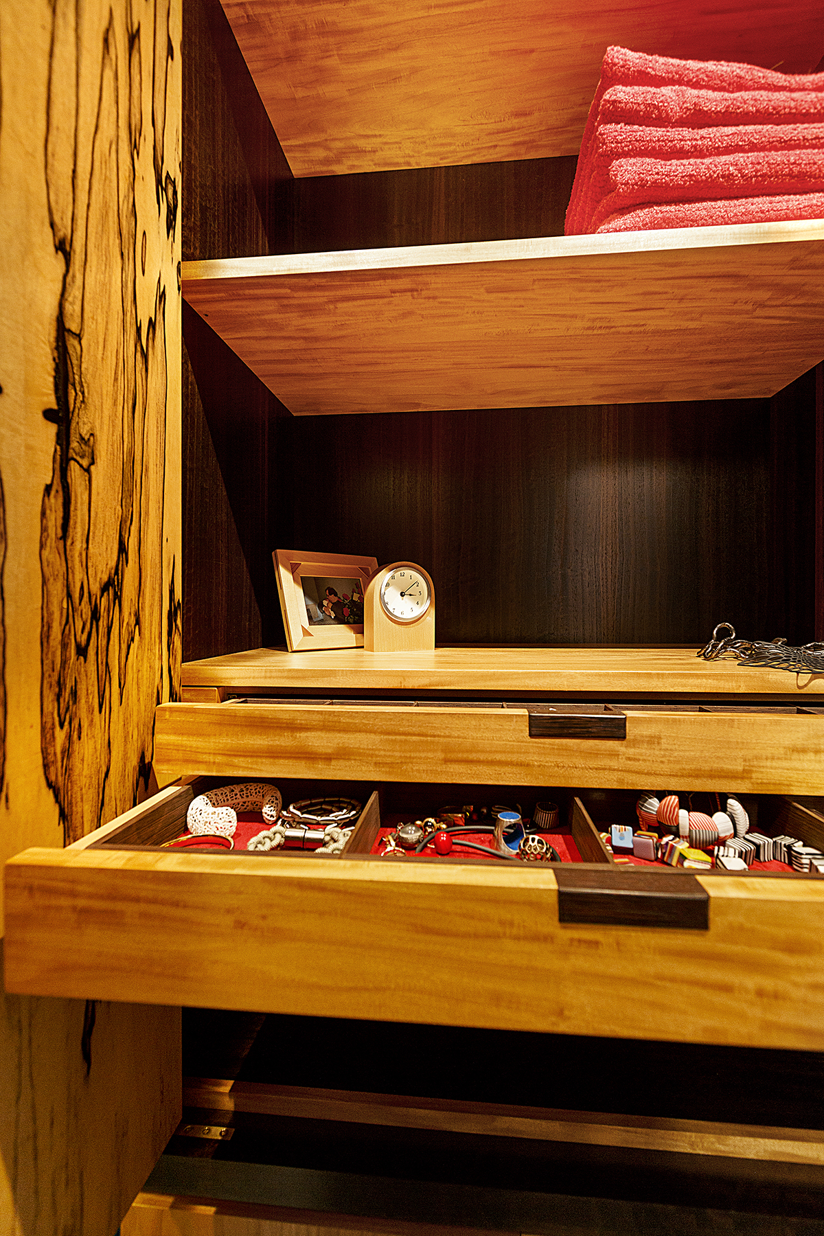 Jewelry drawers in the bedroom cabinetry.