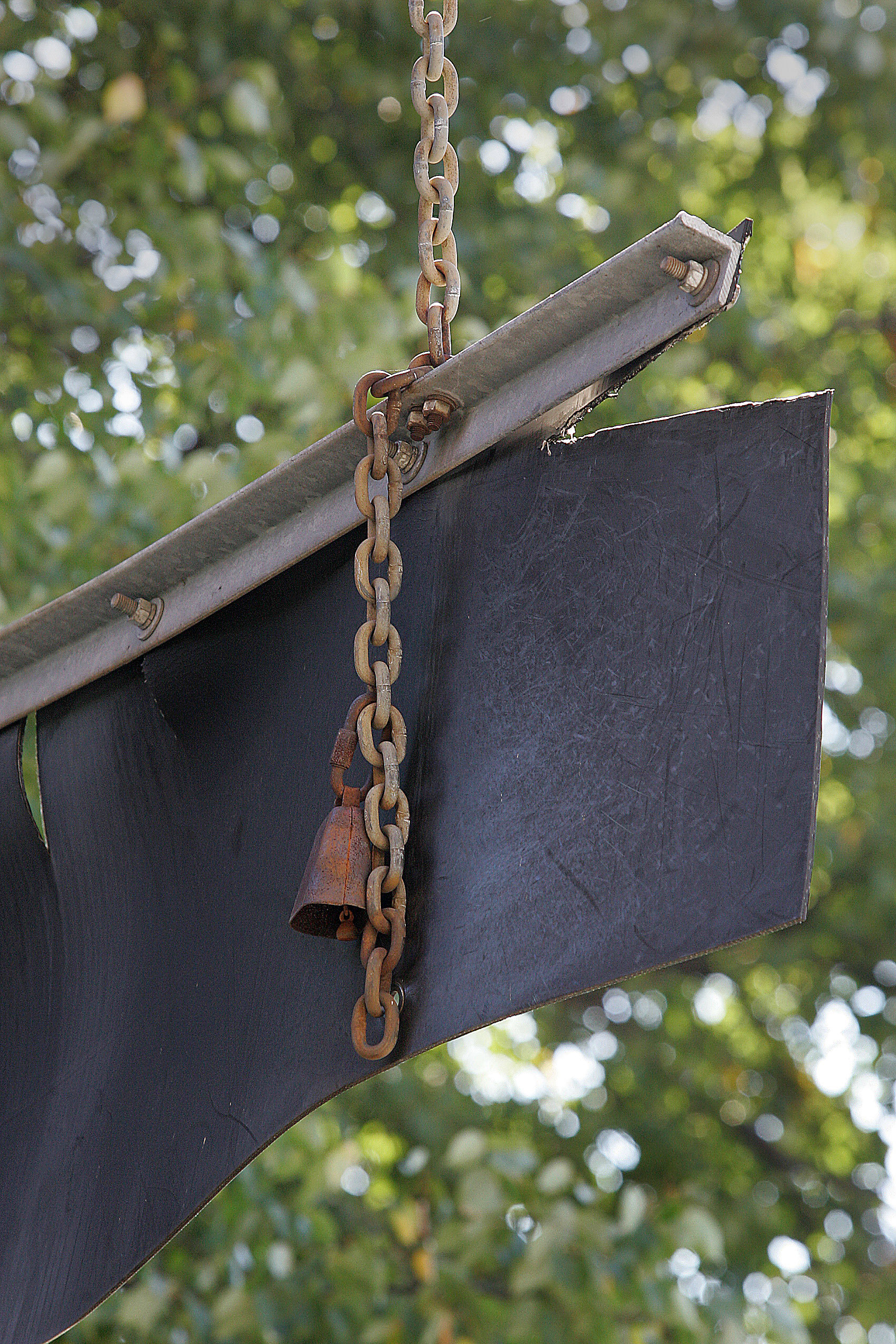 Cowbells once hung from the back of a warning sign at an entrance to Memorial Drive from the Longfellow Bridge.