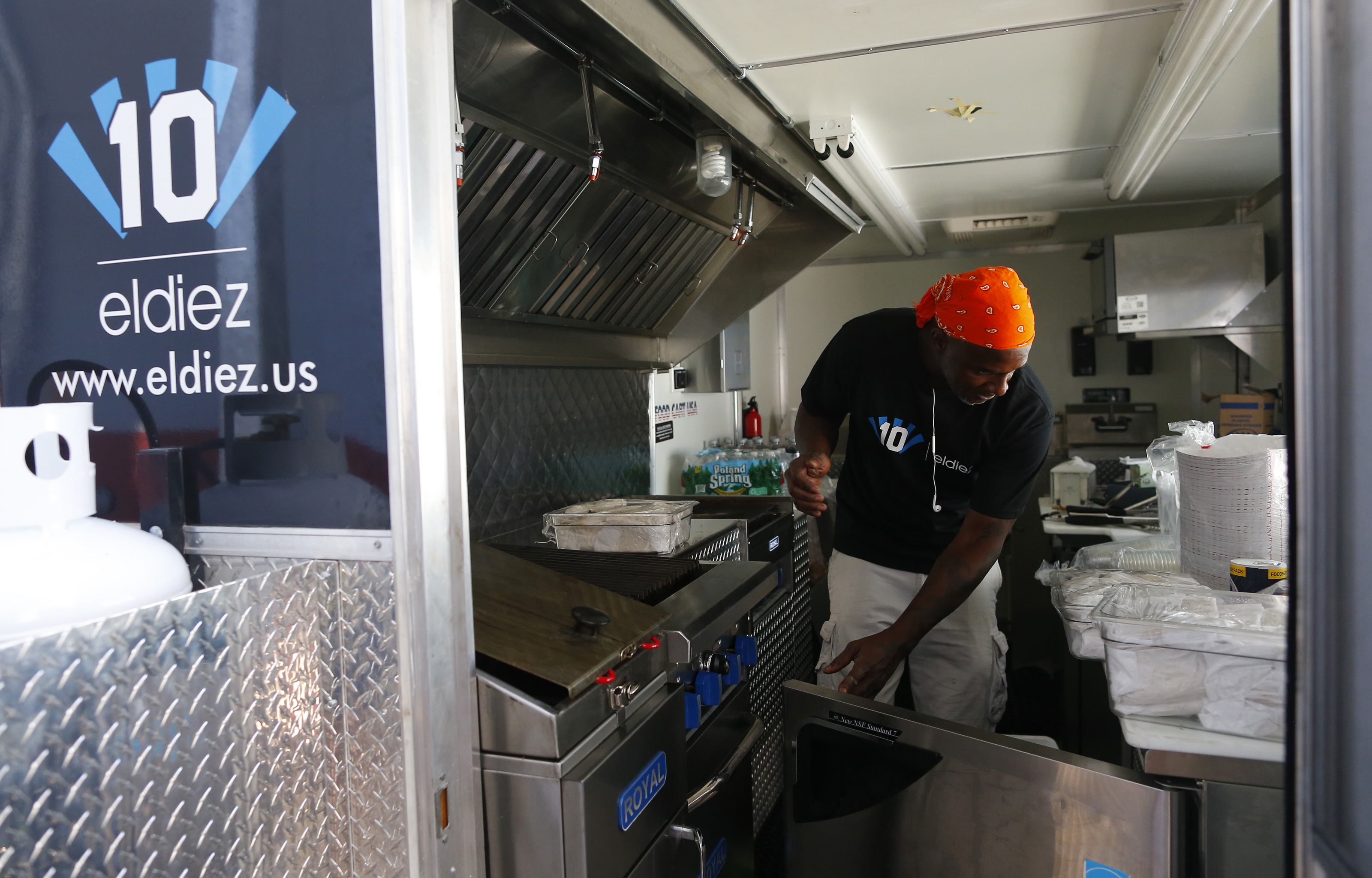 El Diez Argentinian Grill employee James Long, 43, loaded up a food truck after prepping the food in a shared kitchen.