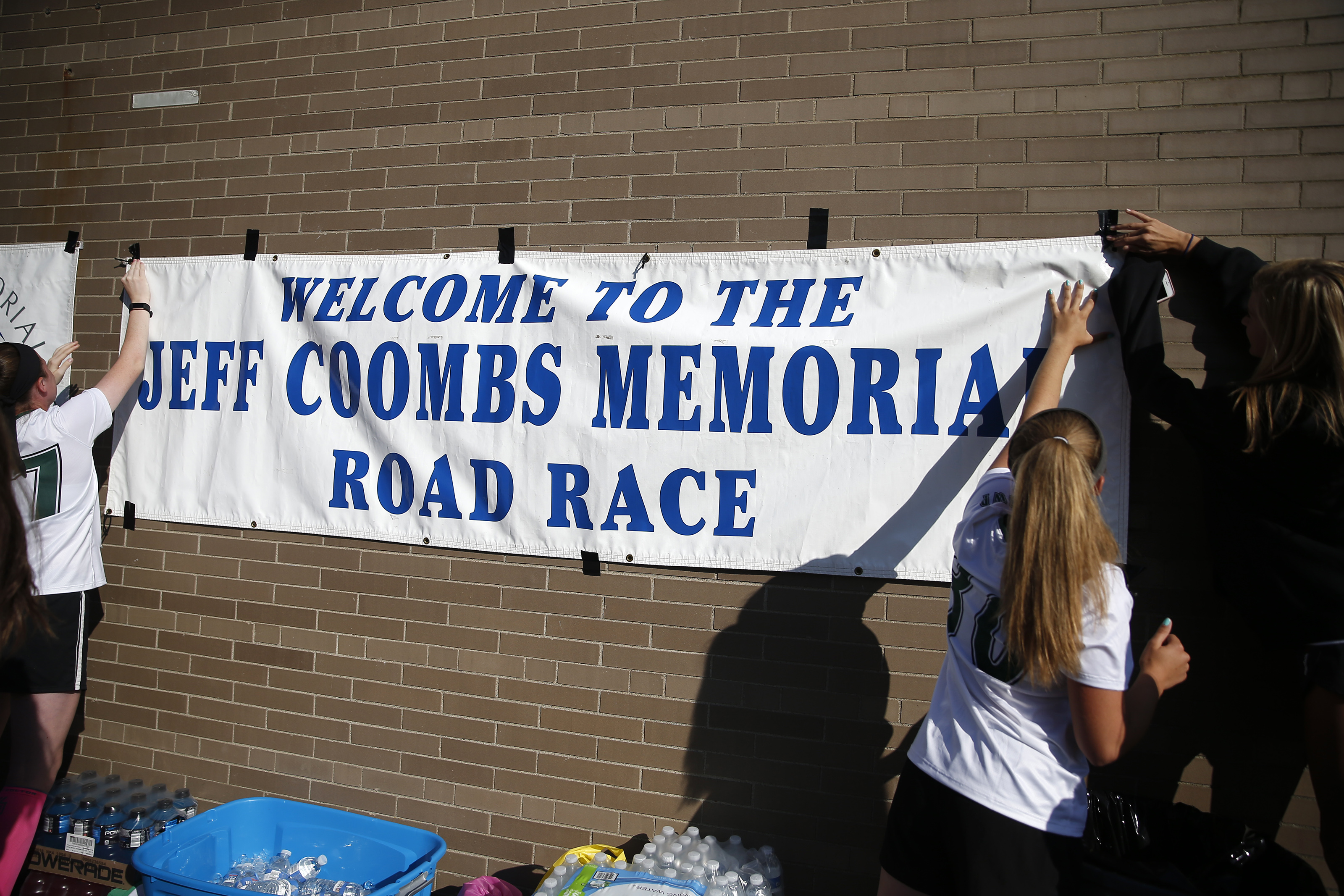 Students hung a banner in honor of Jeff Coombs.