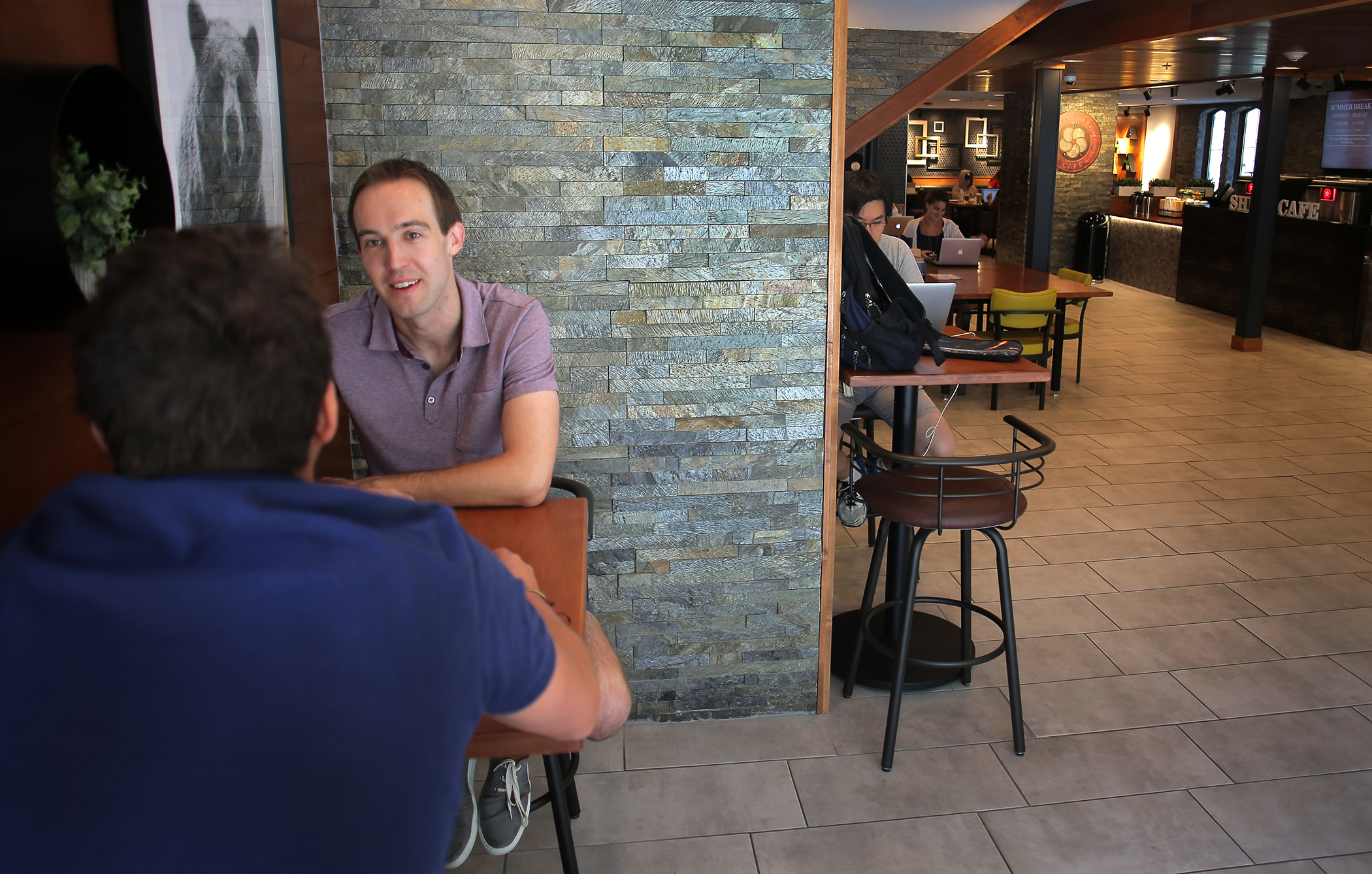 Juan Pablo Uribe and Stefan Hut, PhD students at Brown University, talked and enjoyed free coffee at Shiru Cafe.