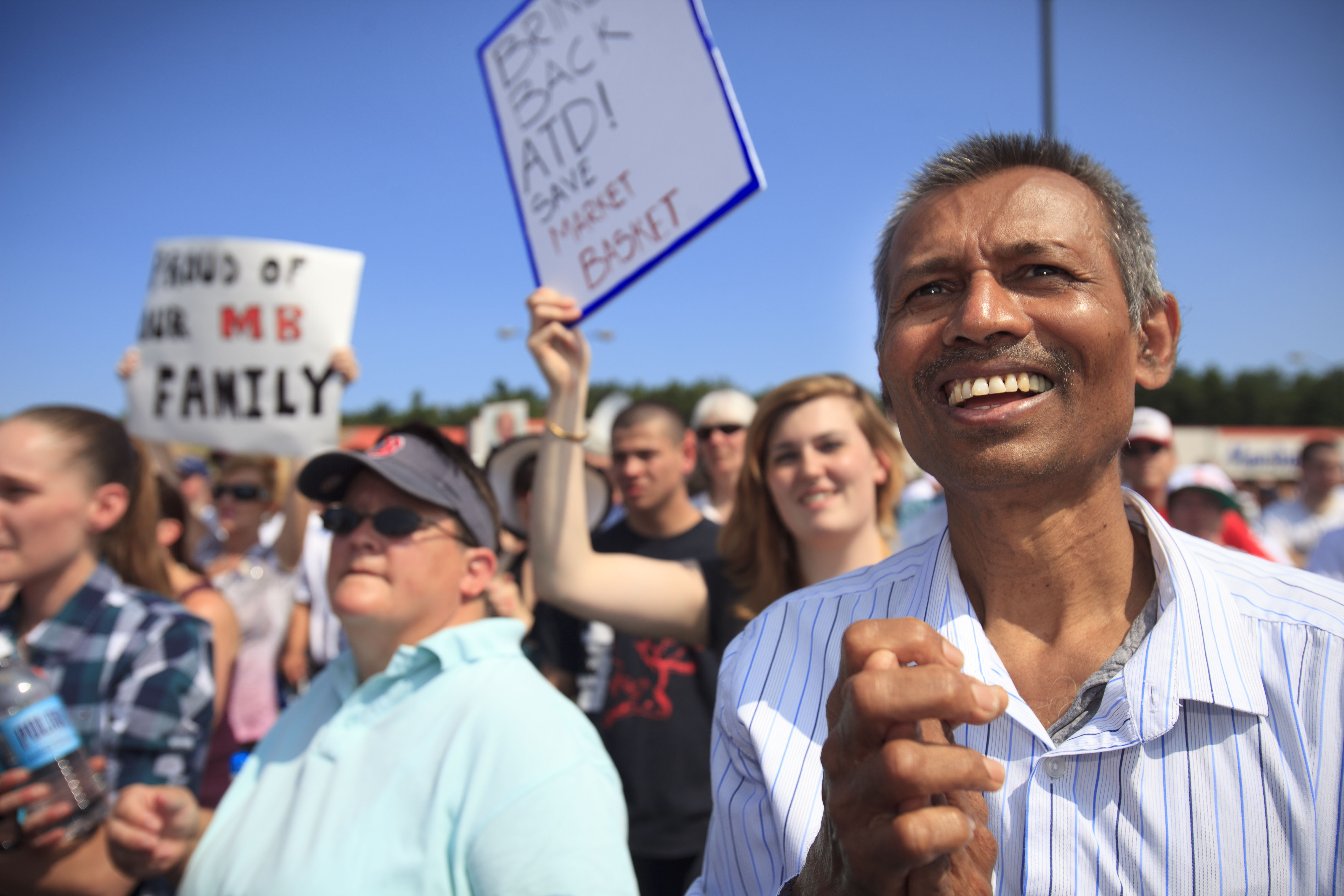 Yogesh Patel of Billerica, a janitor at store 170 in Billerica, cheered at a rally in support of former Market Basket CEO Arthur T. Demoulas.