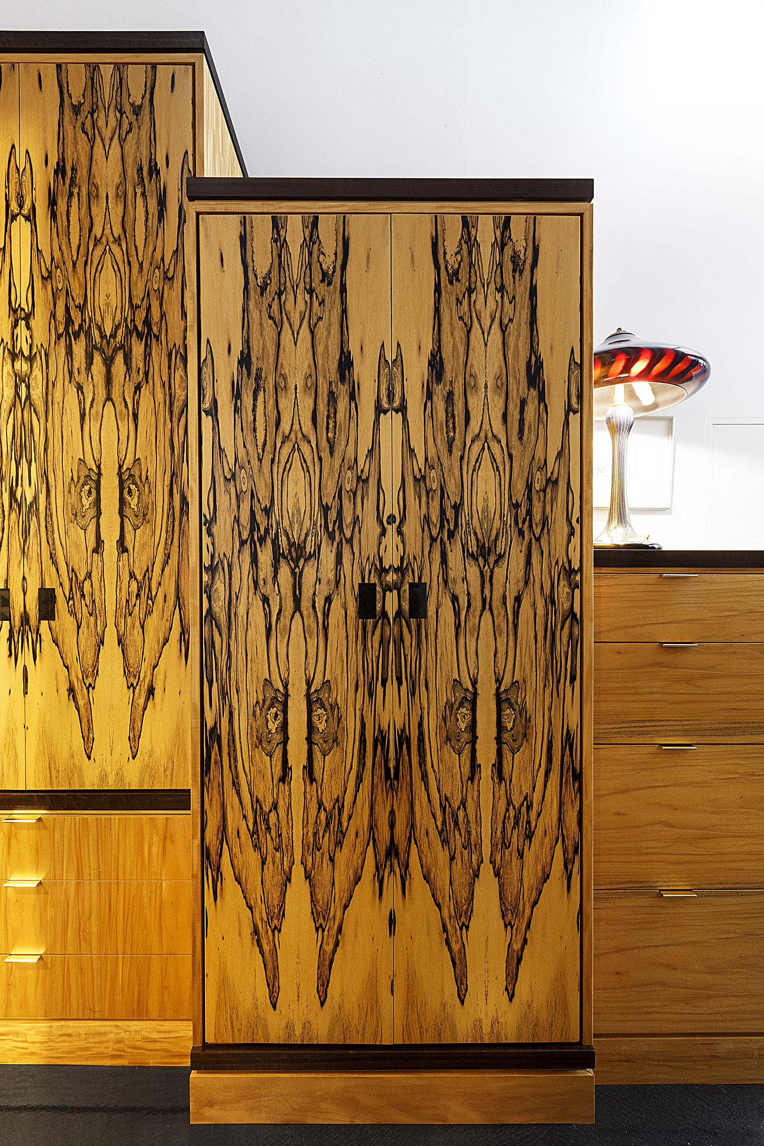 The bedroom built-ins are functional works of art.