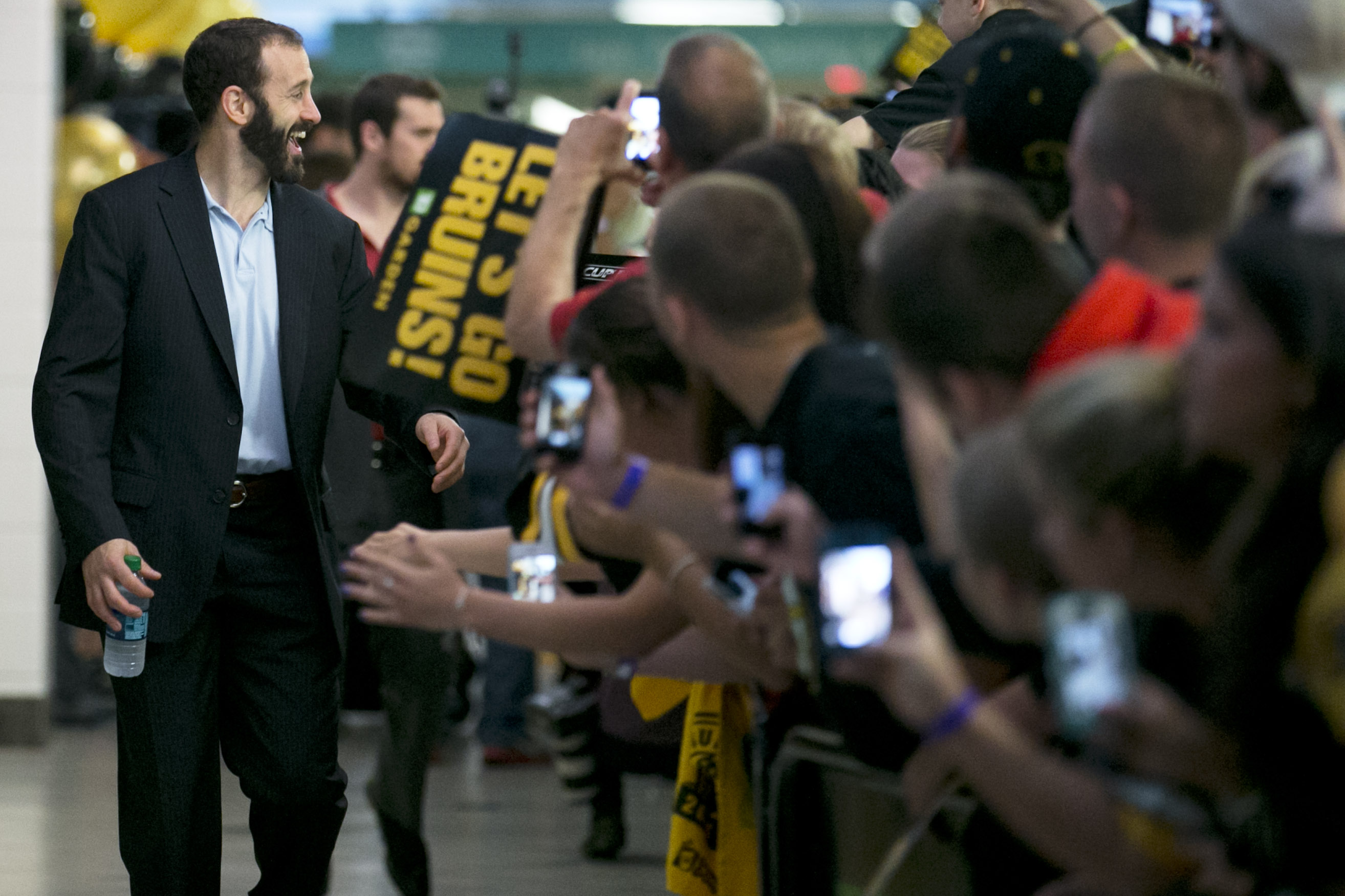Jay Pandolfo (left) is the only Bruins’ coach dedicated to development.