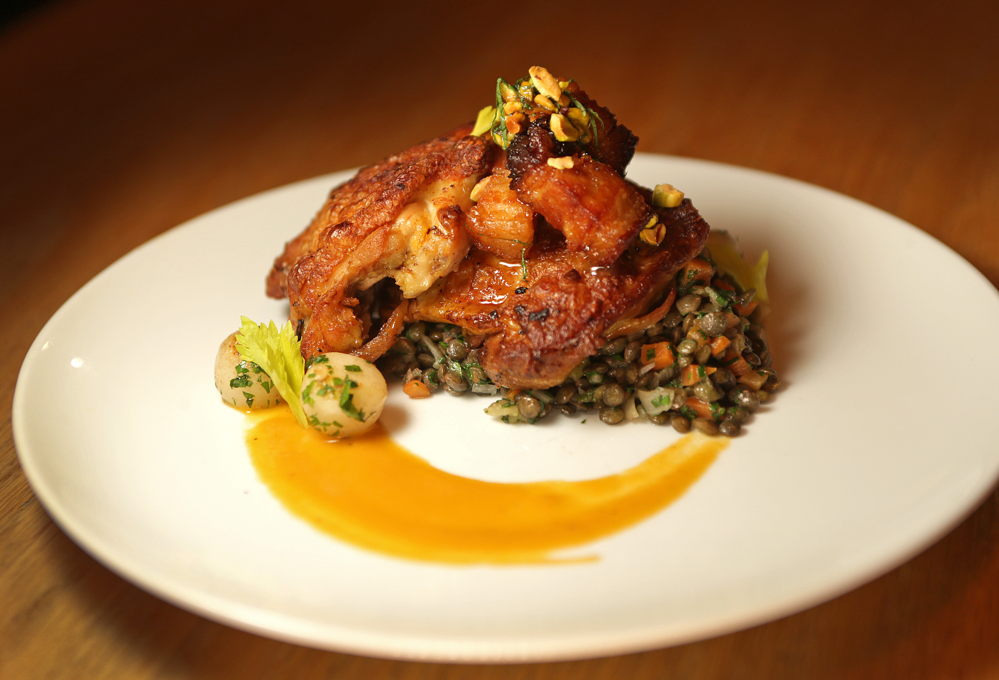 Chicken thighs with lentils, pork belly, turnips, and thyme.