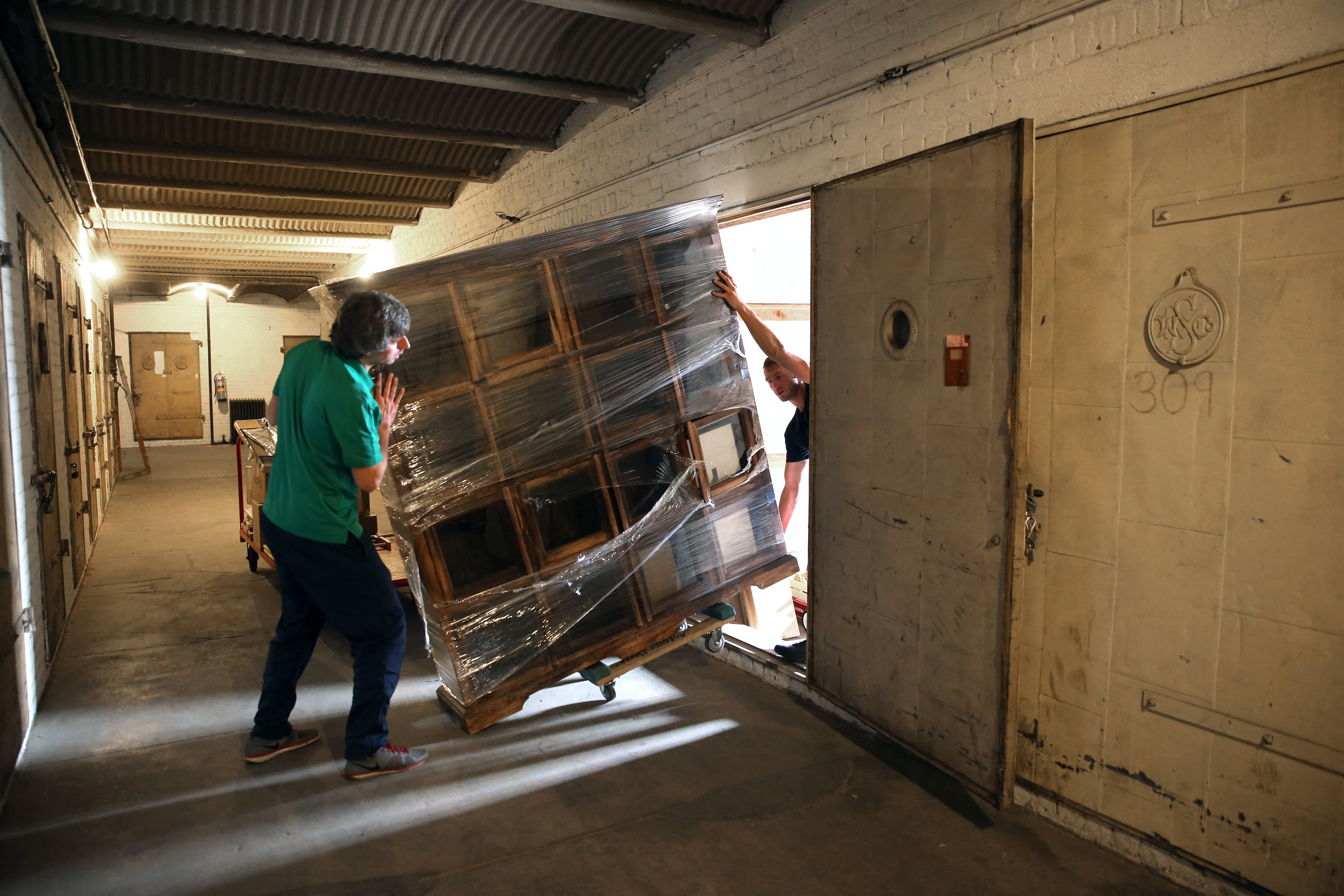 Movers emptied a unit at sprawling Metropolitan Storage in Cambridge.
