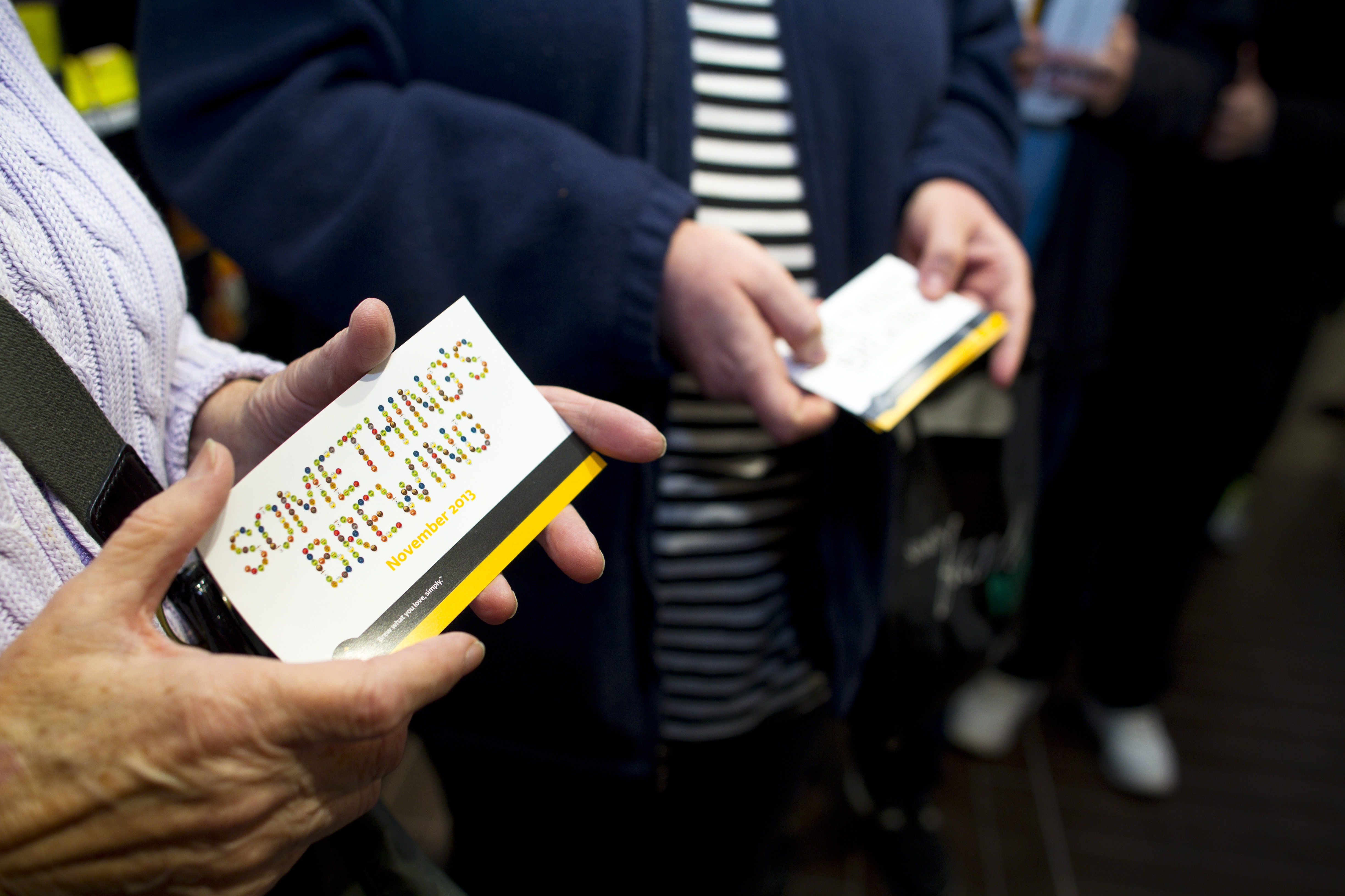 Customers waited in line to receive free Keurig brewers at the opening of the Keurig Store.