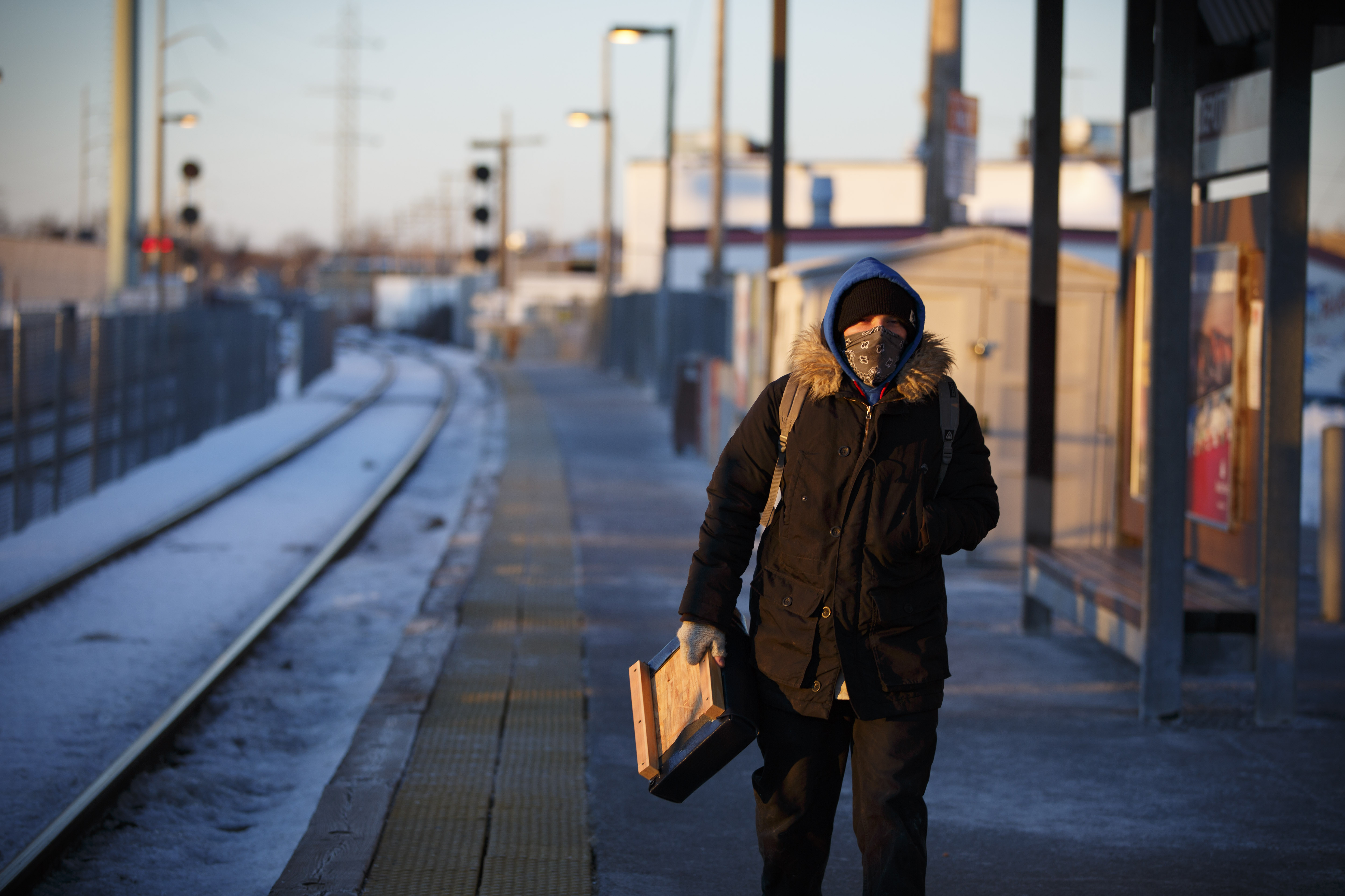 At the Beverly Depot commuter rail station, Jason Burroughs of Gloucester waited in the frigid temperatures for an MBTA train with everything but his eyes covered up.
