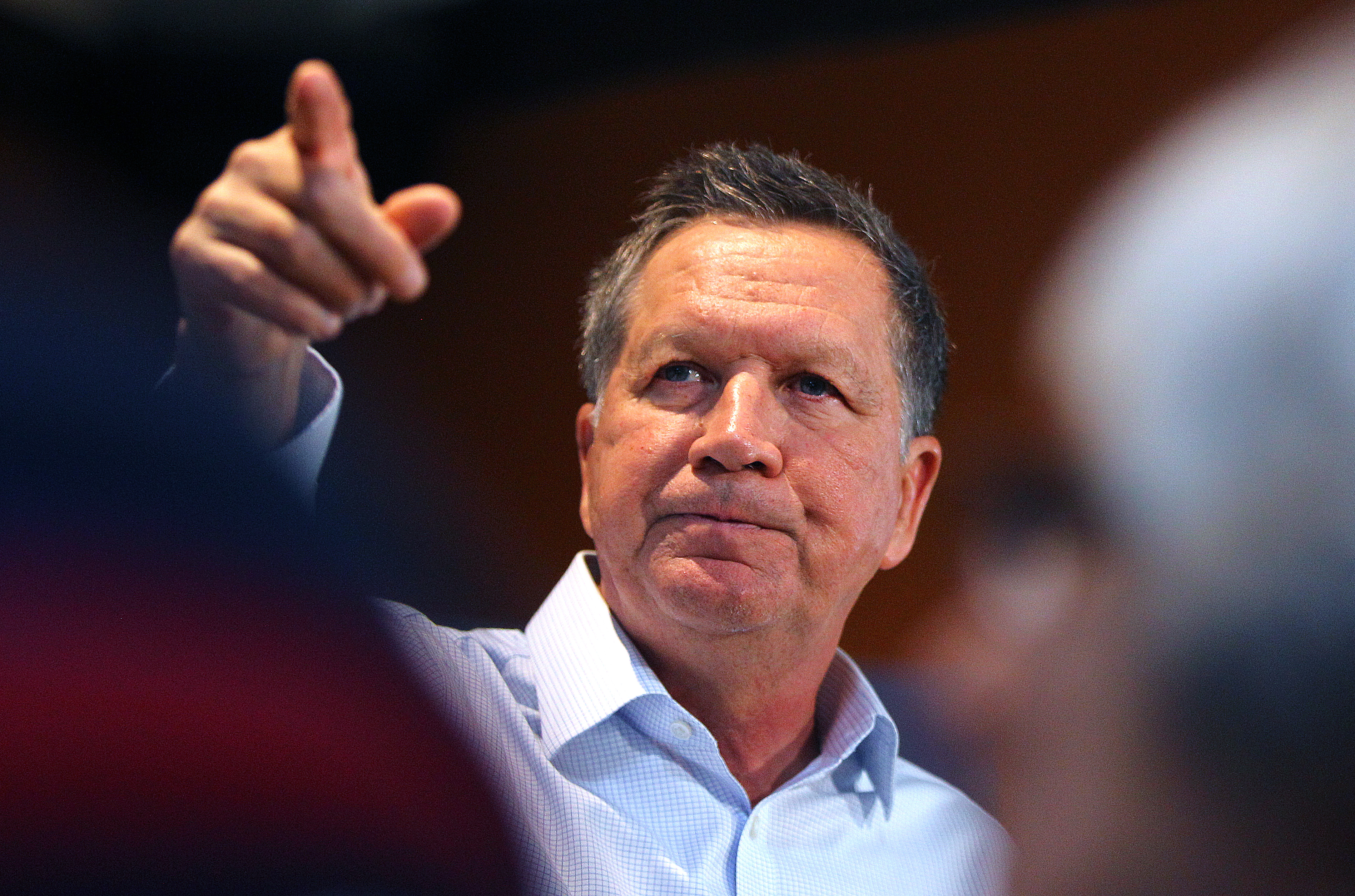 Kasich gestured Tuesday during a town hall-style meeting in New Boston.