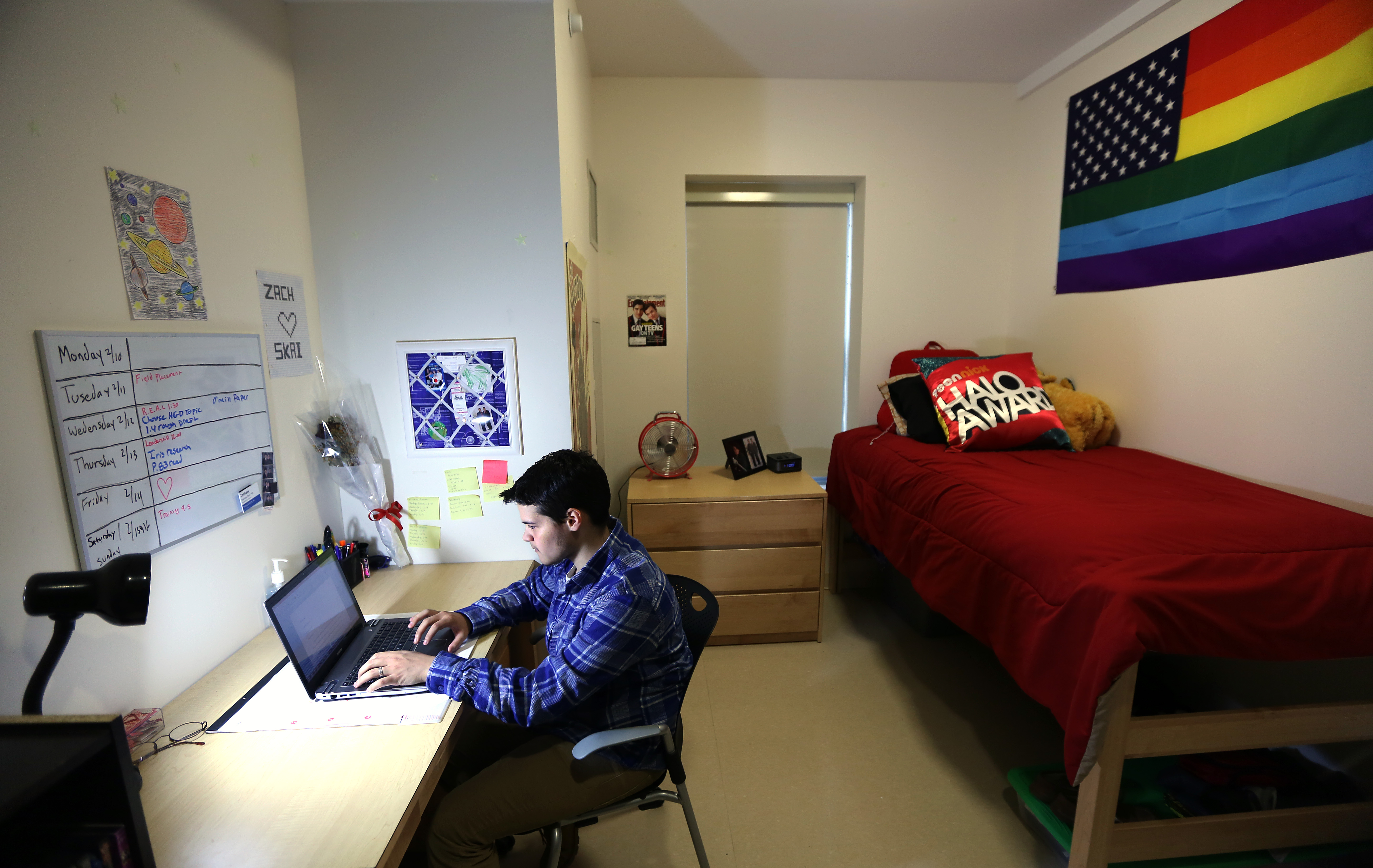 Zach Kerr in his dorm room at Wheelock College.