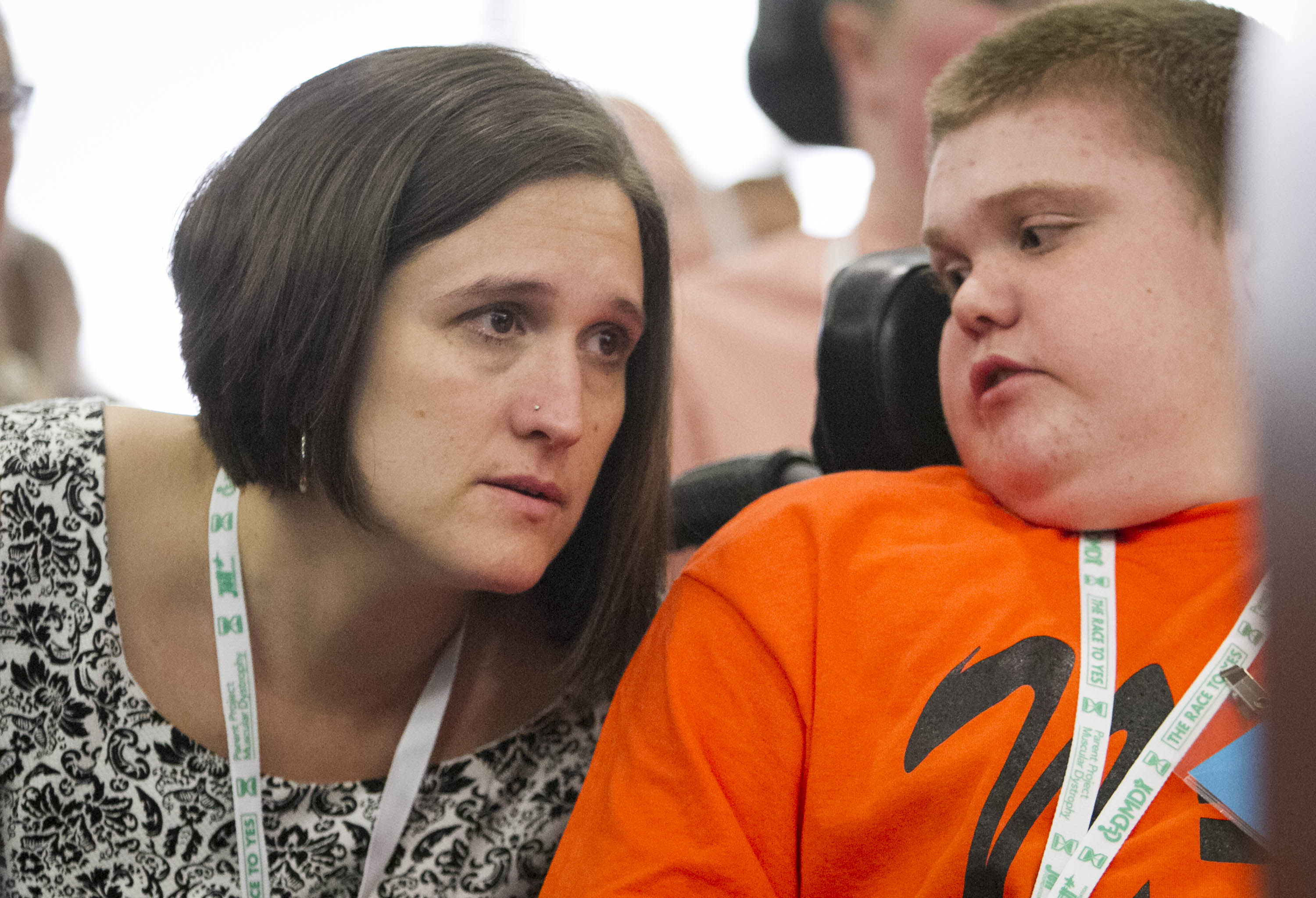 Jenn McNary spoke with Austin Leclaire, who suffers from Duchenne muscular dystrophy, during the FDA advisory committee hearings on Monday.