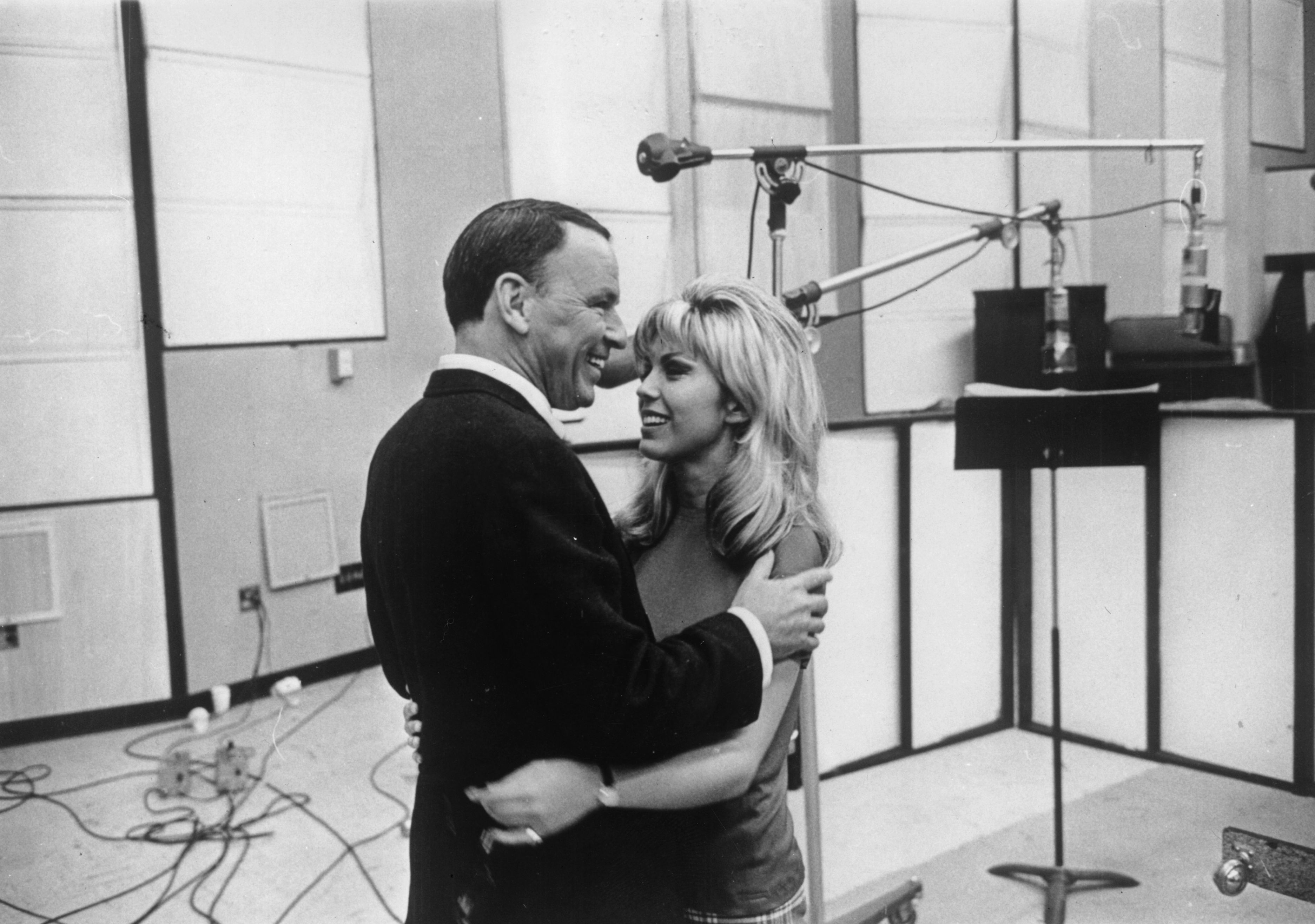 Nancy Sinatra with her father, Frank Sinatra, at their first joint recording session.