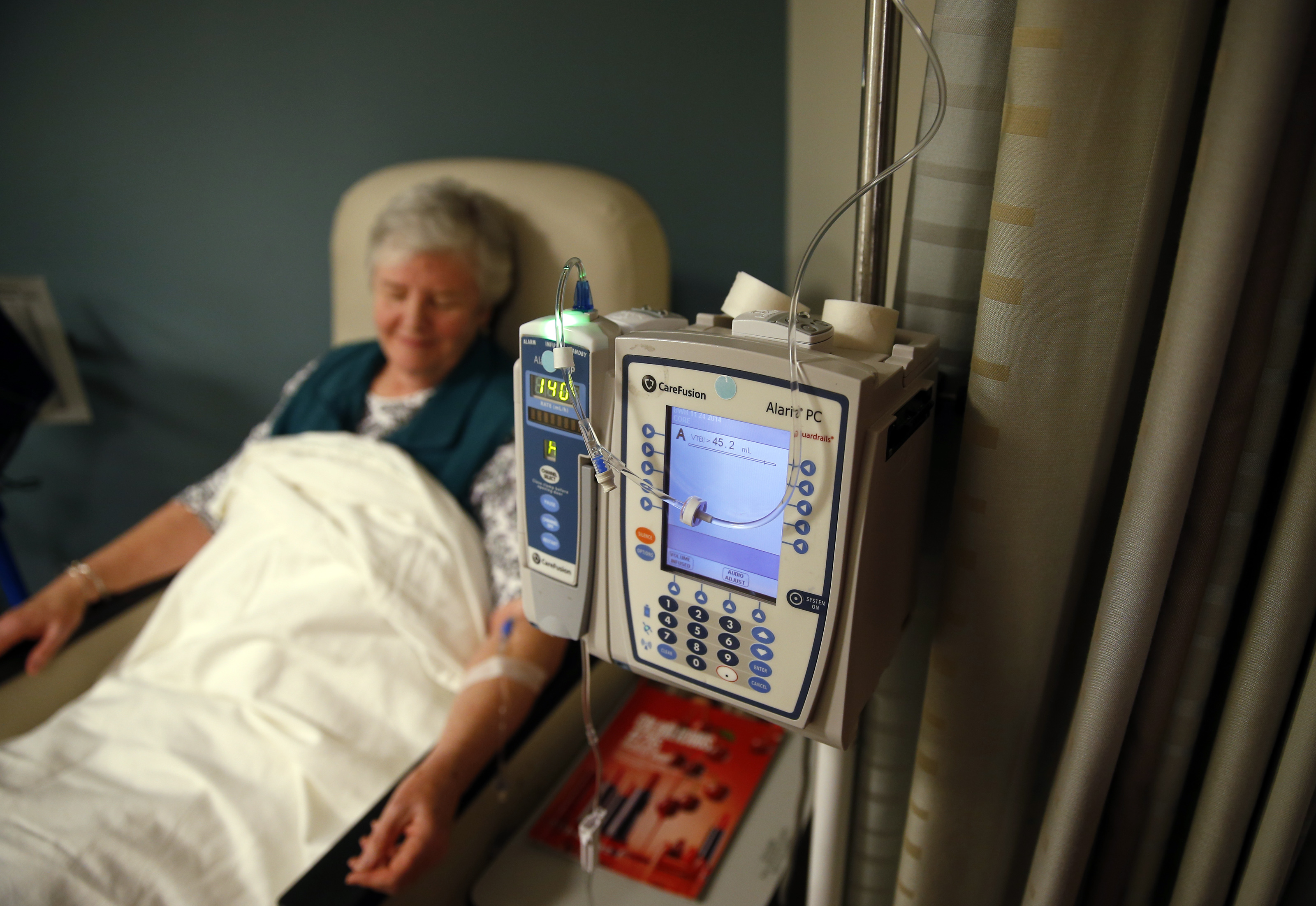 Helene DeCoste, 67, got her study medication intravenously infused Thursday as she participated in an Alzheimer’s study at Brigham and Women’s Hospital.