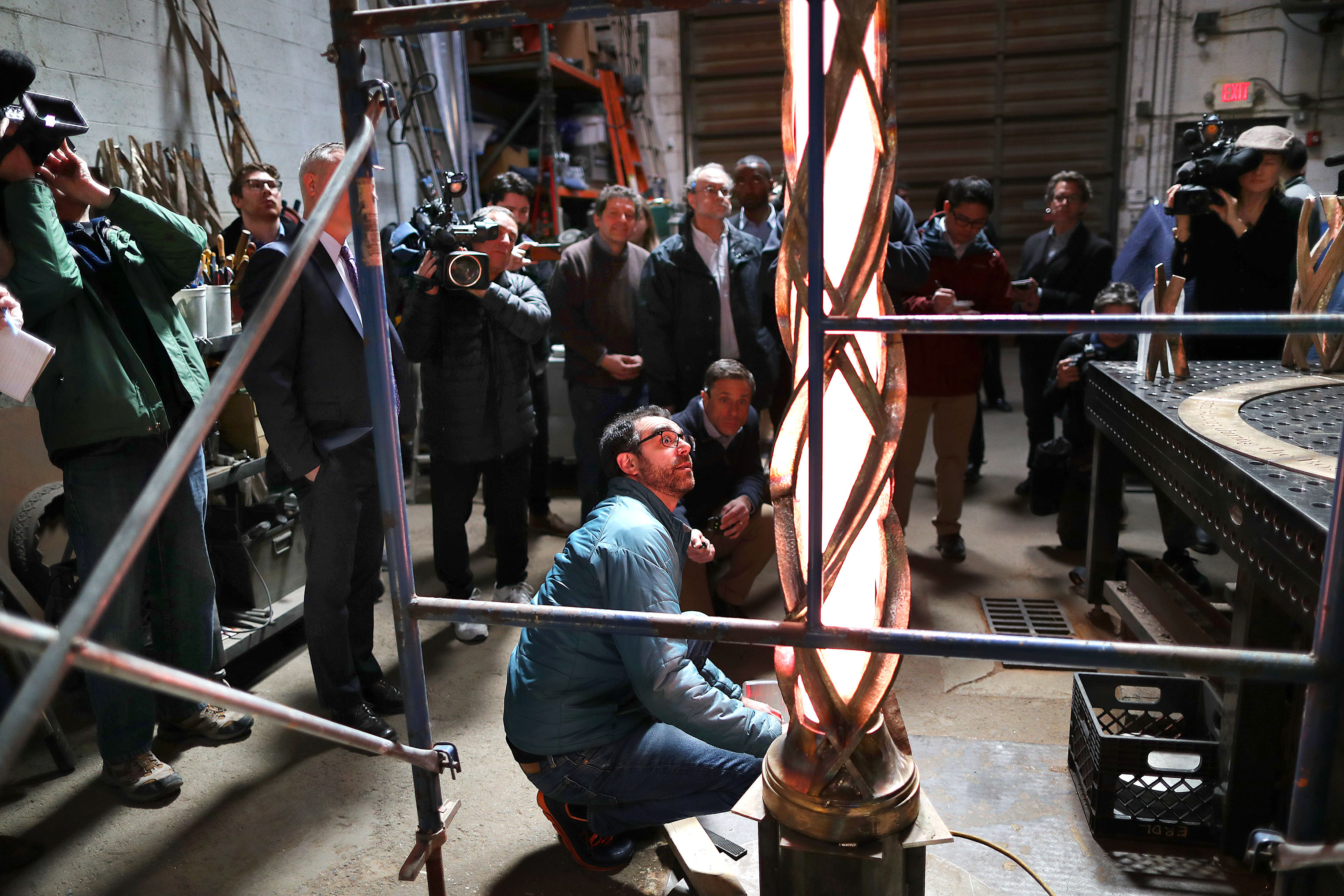 At a Chelsea foundry, work continued on the Boston Marathon memorial.