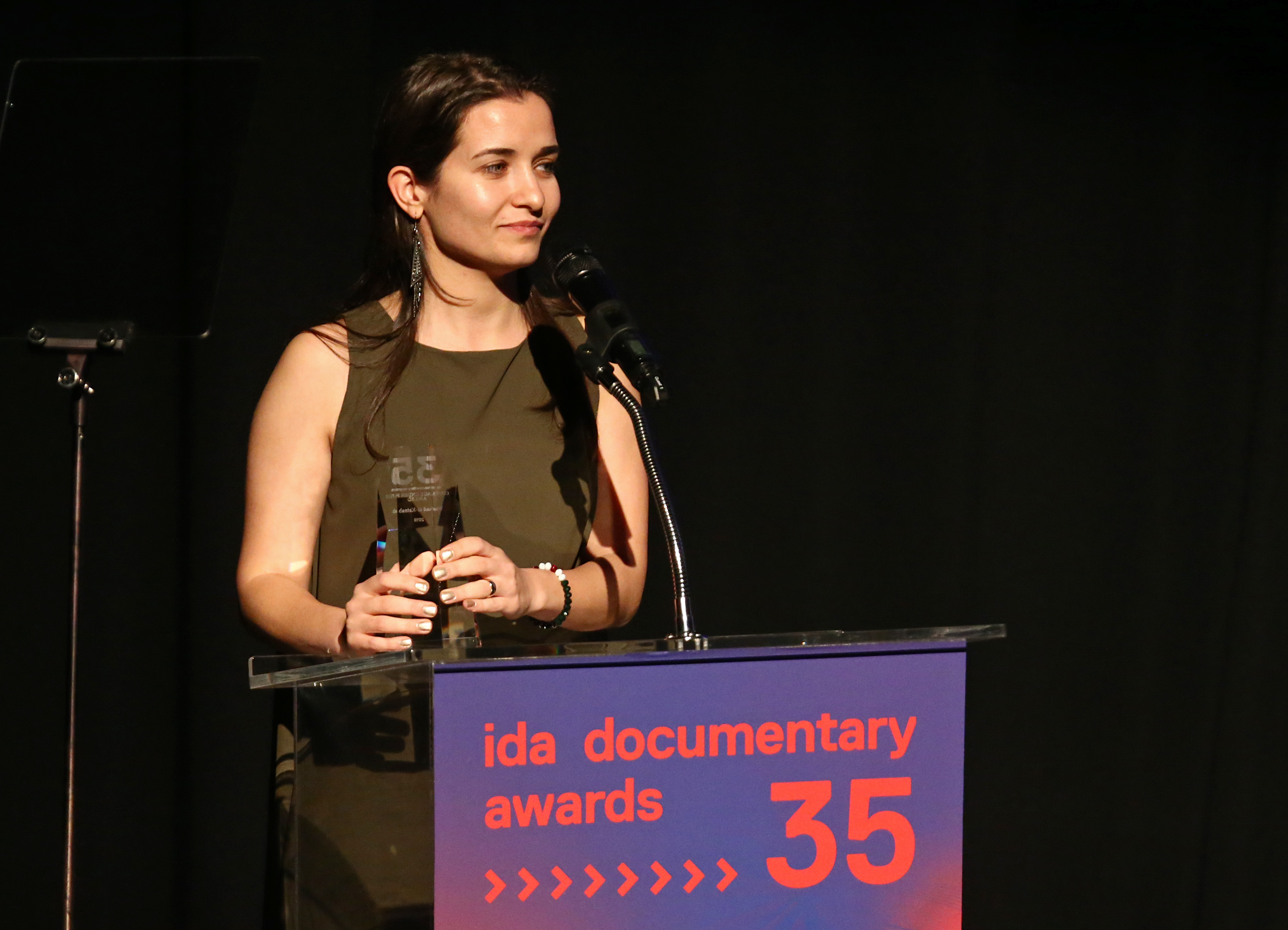 Filmmaker Waad Al-Kateab accepts the Courage Under Fire Award for "For Sama" onstage during the 2019 IDA Documentary Awards at Paramount Pictures on Dec. 7, 2019 in Los Angeles.