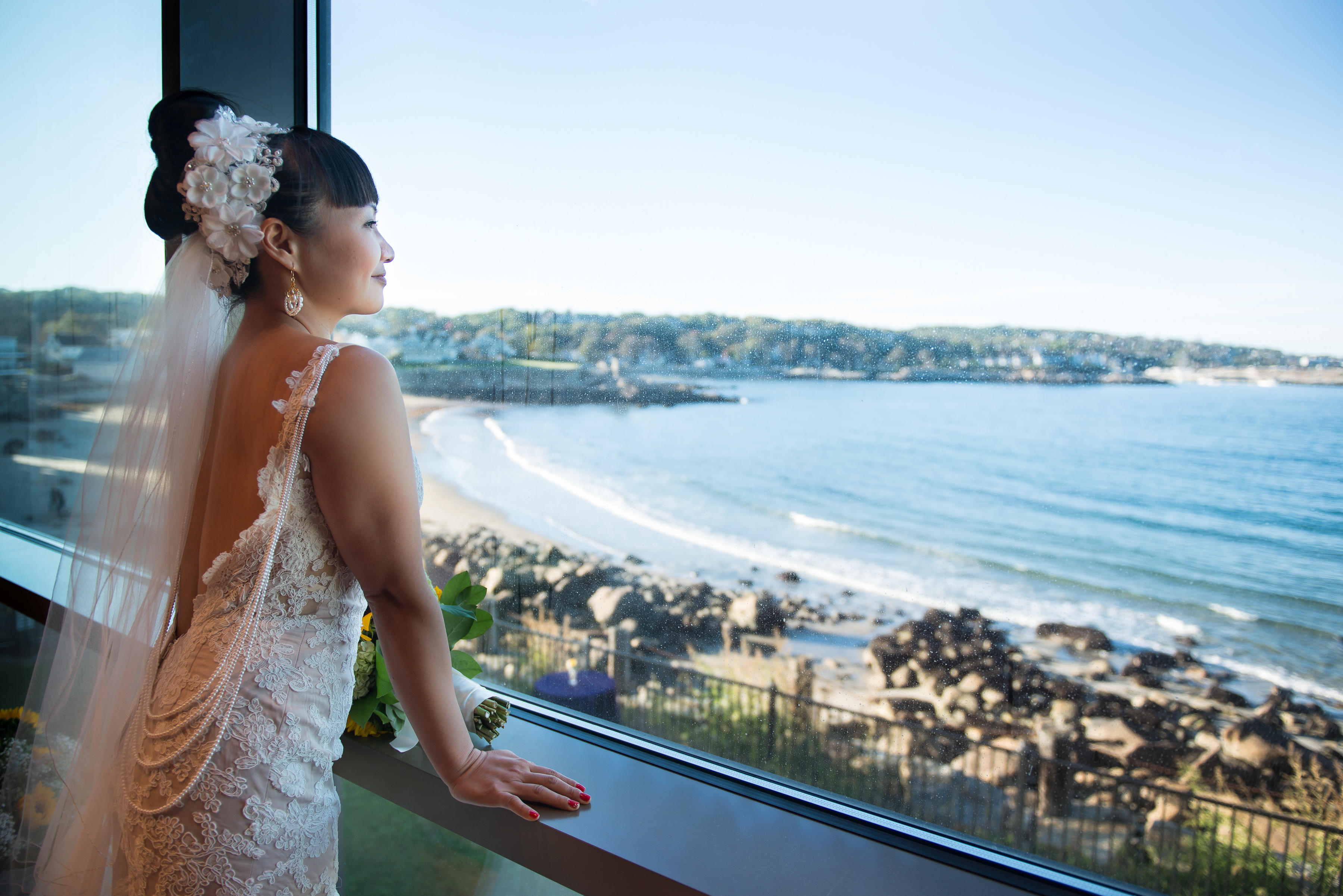 Aisling Juanjuan Niska (left) held her wedding at Shalin Liu Performance Center, overlooking the sea in Rockport.