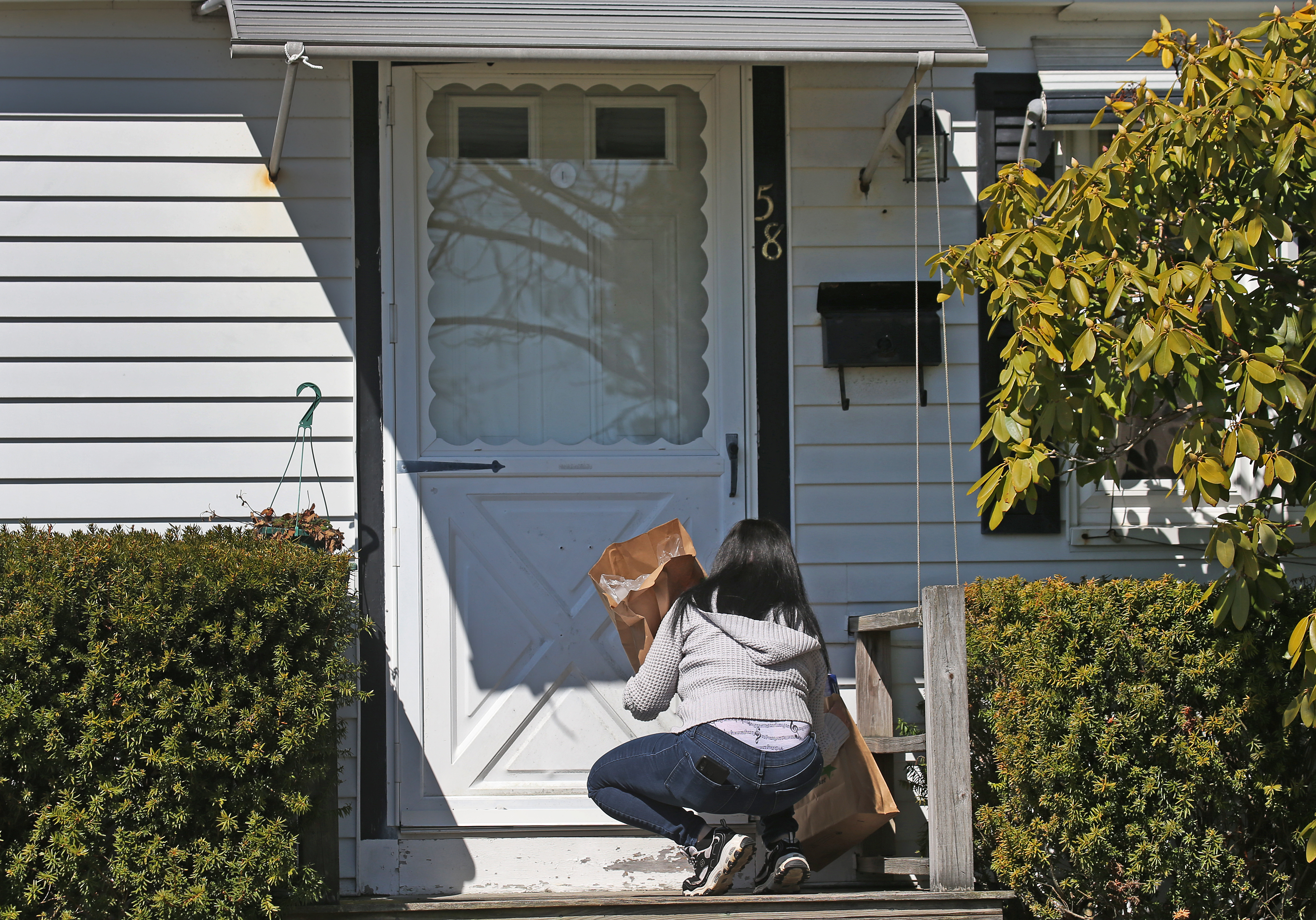 Instacart shopper Loralyn Geggatt made a delivery to the home of a customer in Falmouth.
