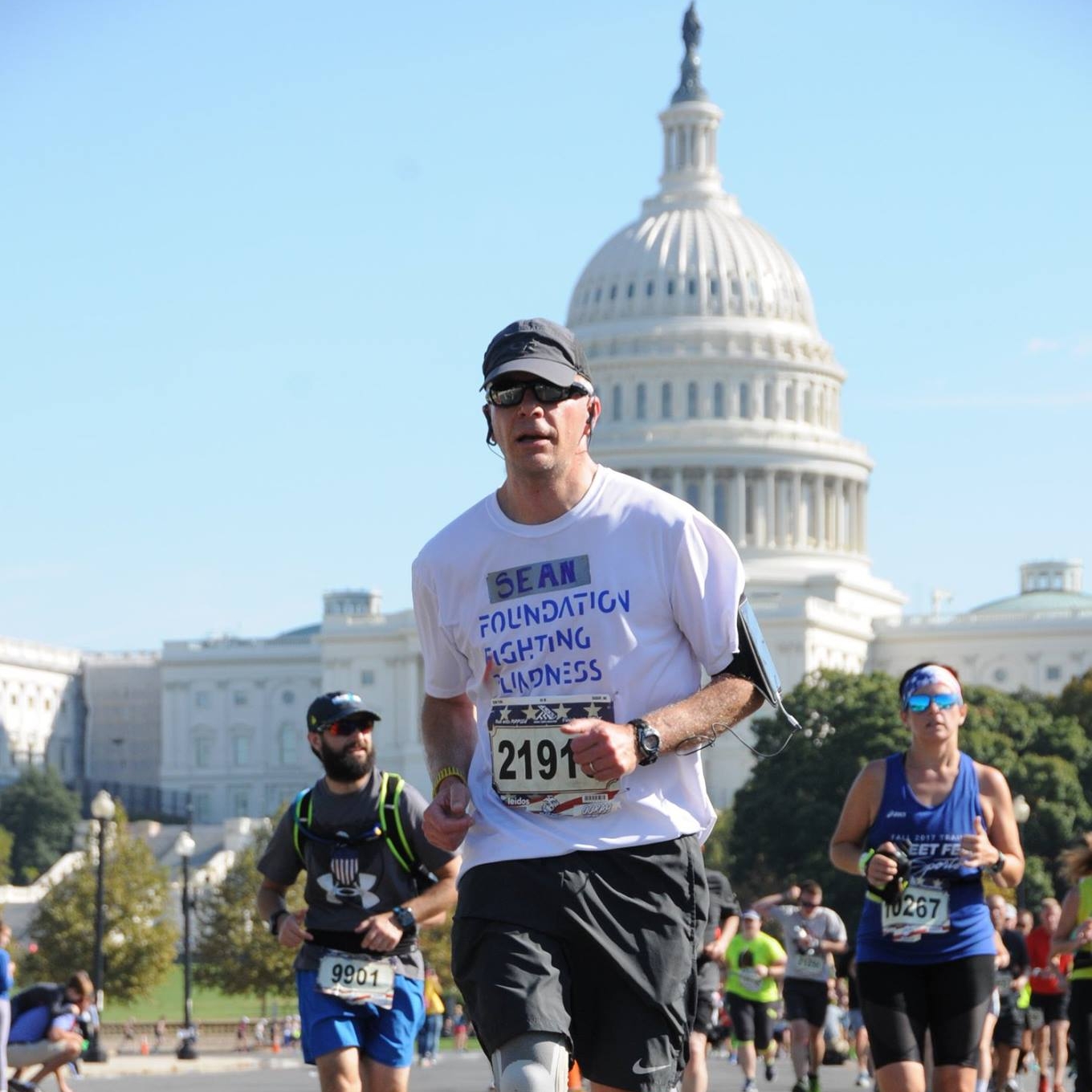 Sean Teare, a 48-year-old who has age-related macular degeneration, ran the Marine Corps Marathon last year.