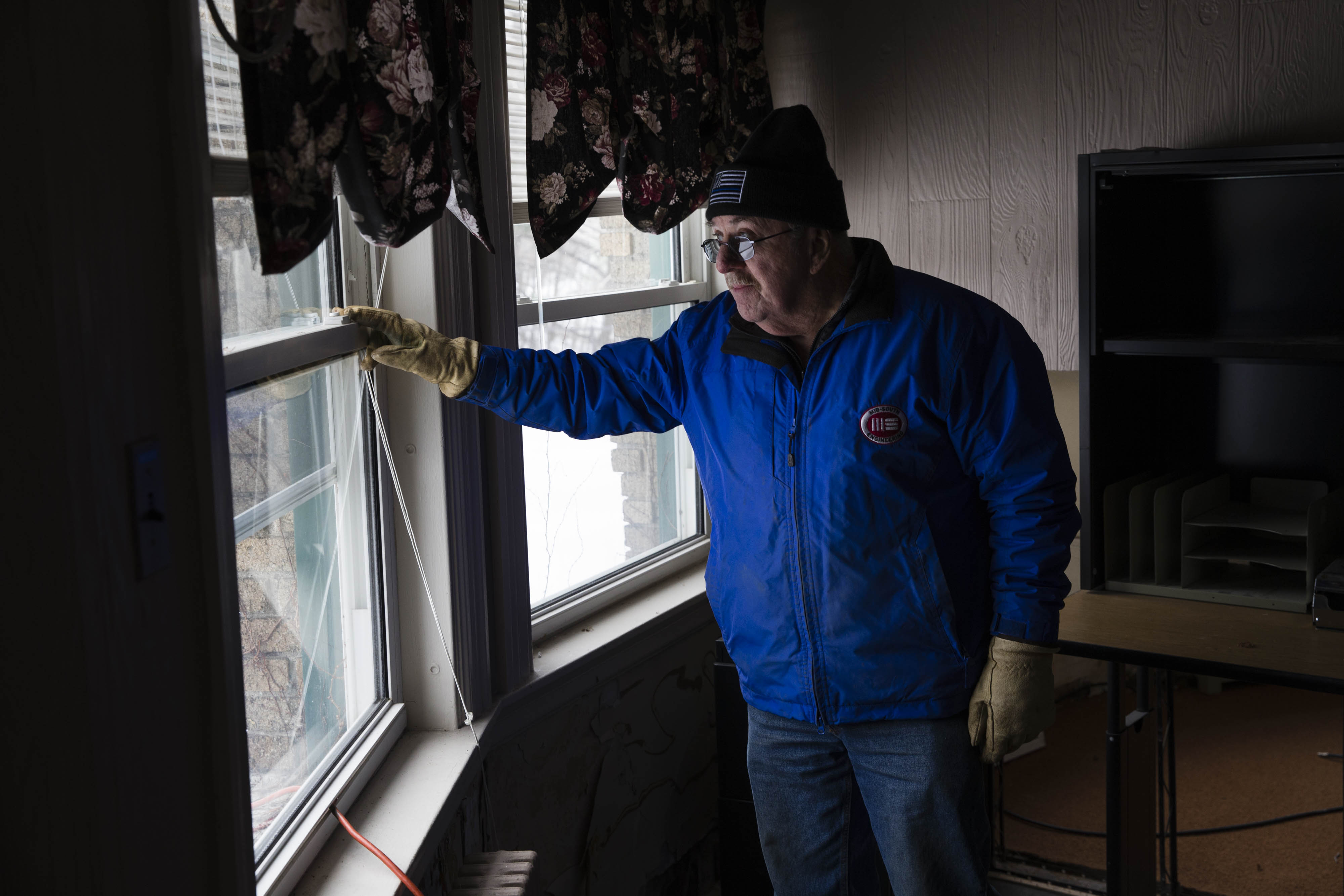 Former Great Northern employee Dick Angotti looked out of the window of the shuttered mill.