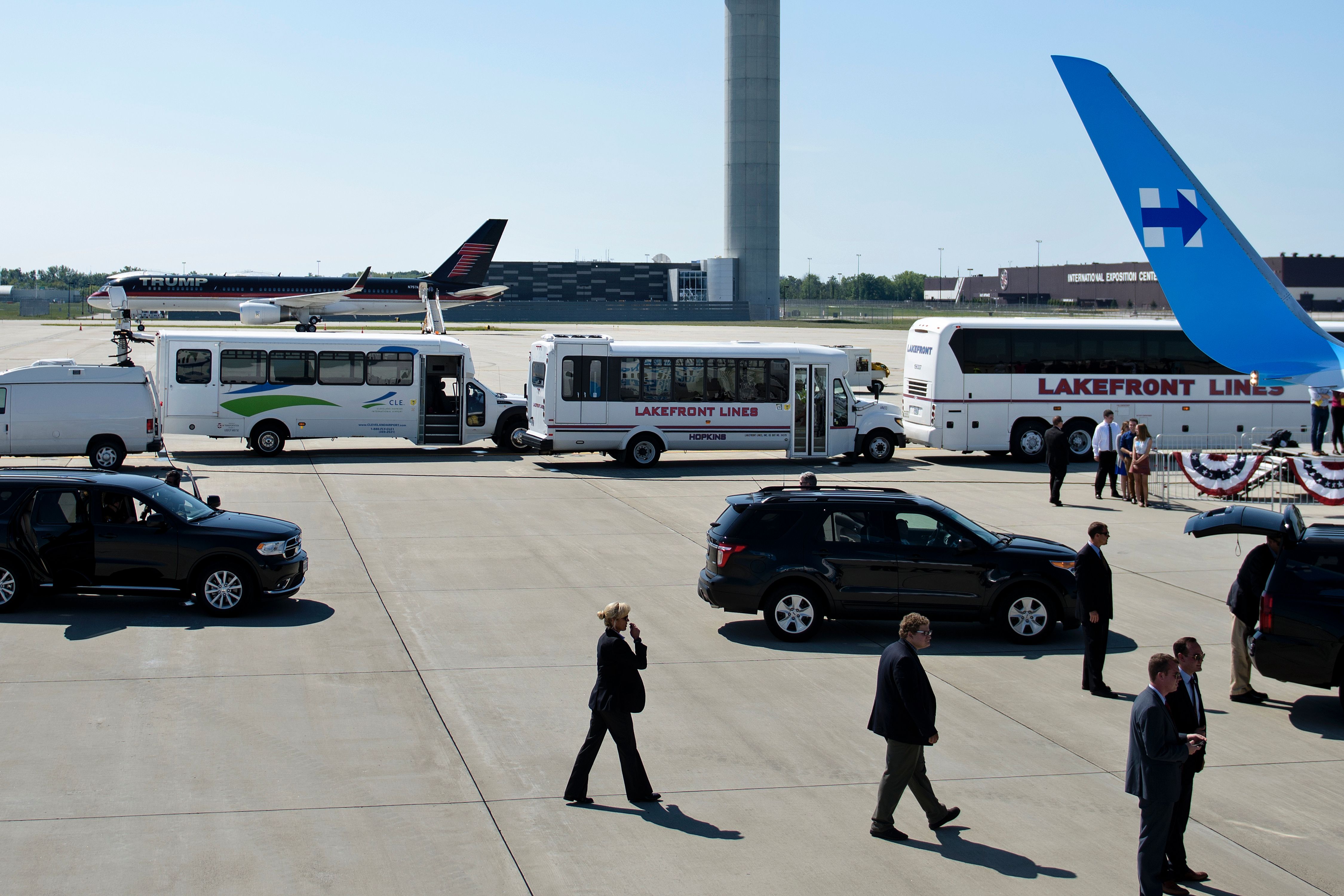 The campaign planes of Trump (left) and Clinton (tail shown at right) were at Cleveland Hopkins International Airport on Monday at the same time.