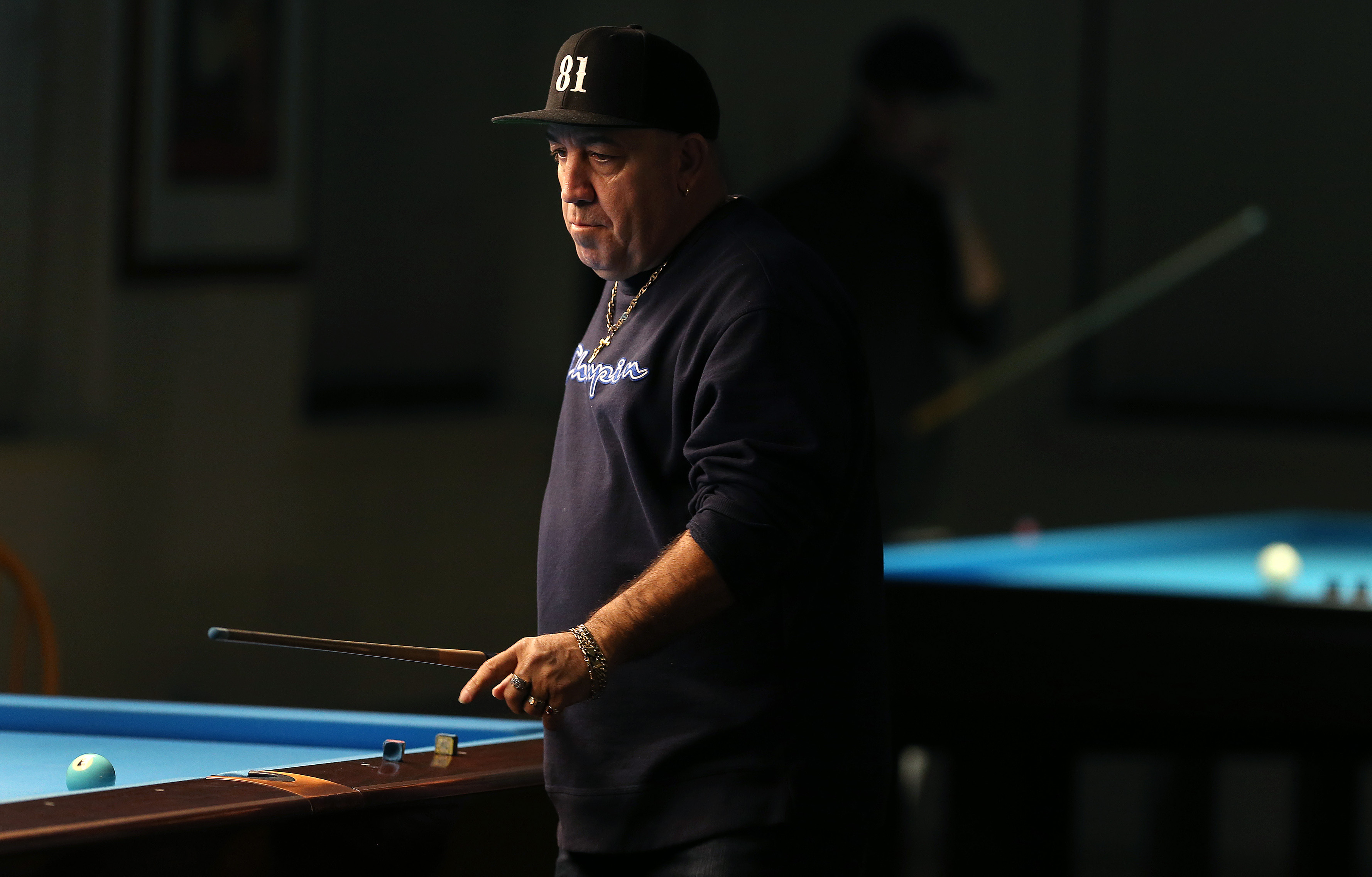 A regular named Louie Figueroa, or preferably Screwy Louie, looked at a shot.