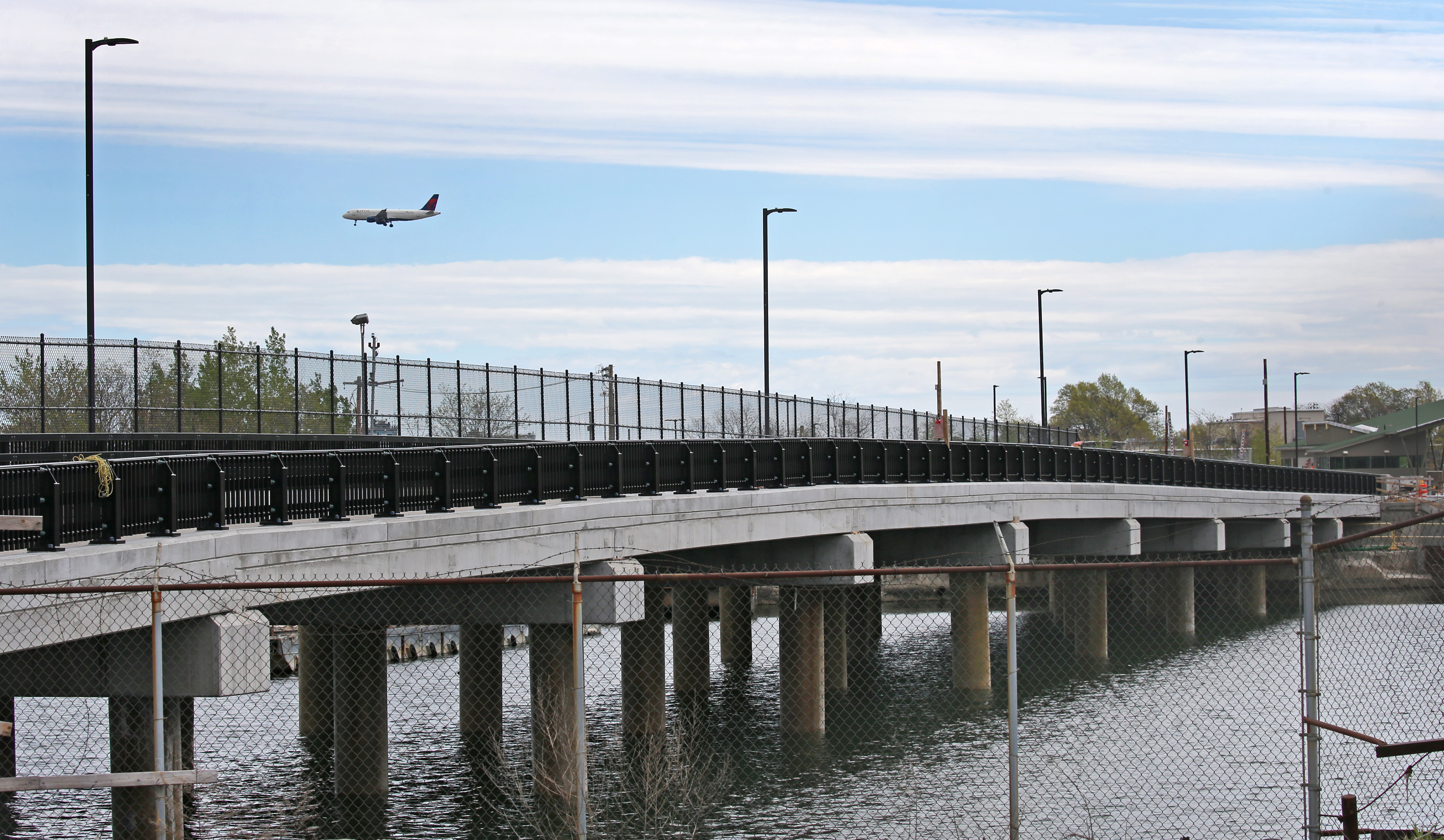 Water views from the complex, however, could feature hundreds of heavy trucks a day on a new freight road connecting the nearby Conley Shipping Terminal with the Summer Street bridge.