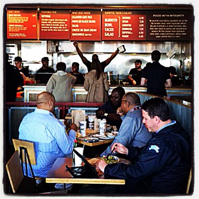 Charles Wright waved from behind the counter at the Chipotle where Hillary visited this week.