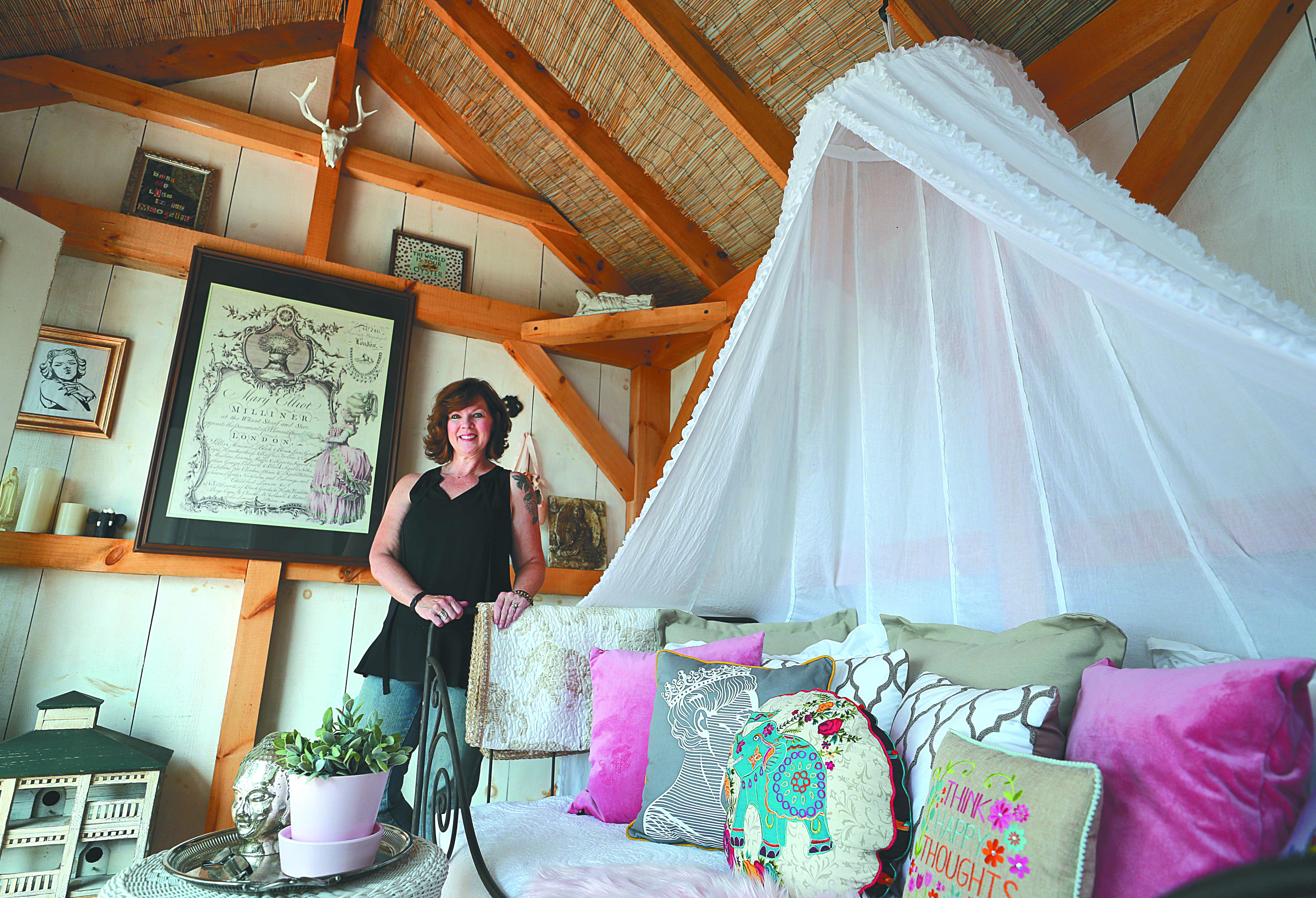 Laureen Clauson often walks the 20 feet from her home to her shed and enjoys morning coffee or evening wine by candlelight.