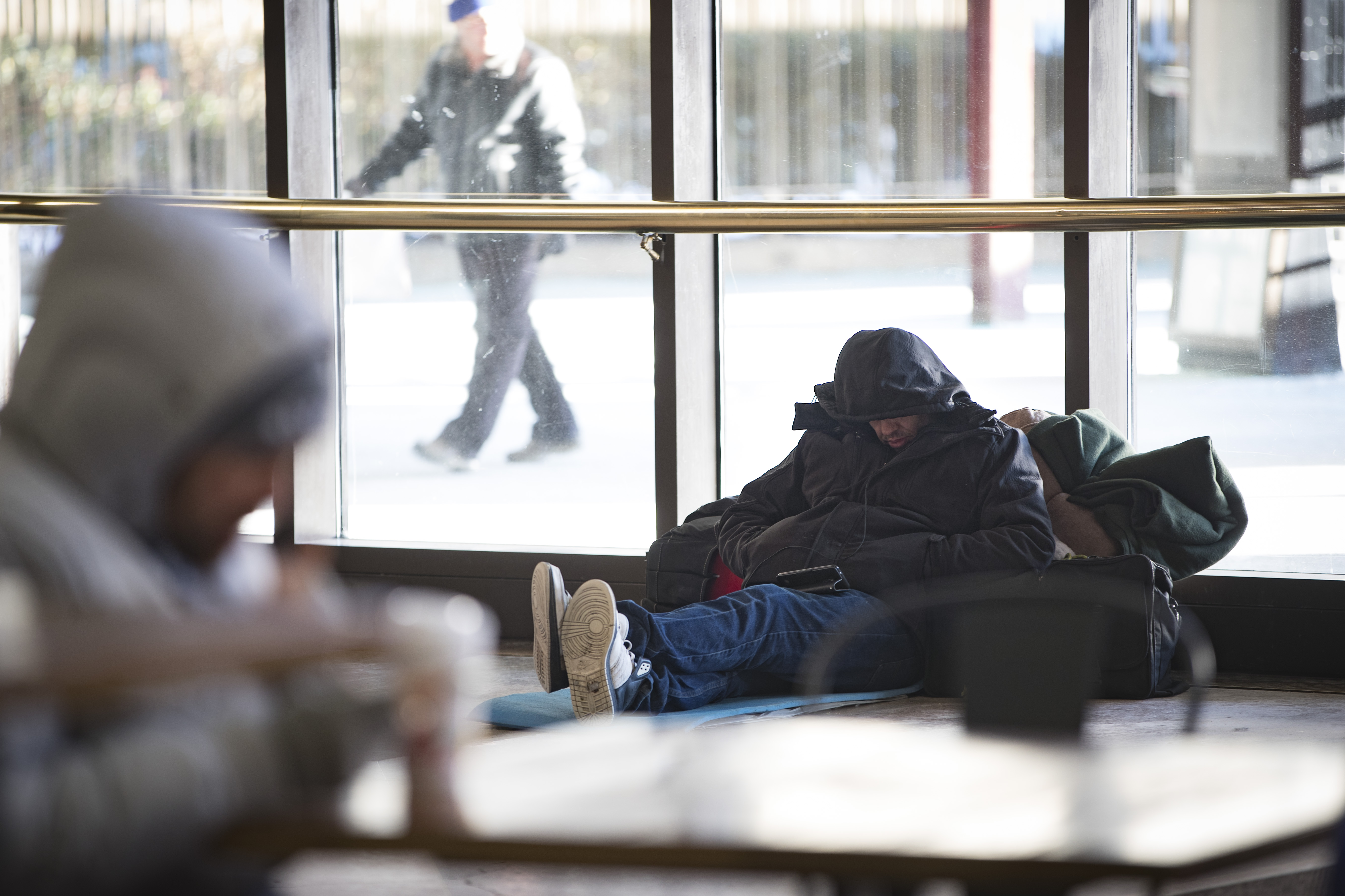 Homeless people sought refuge Monday in South Station’s main atrium.