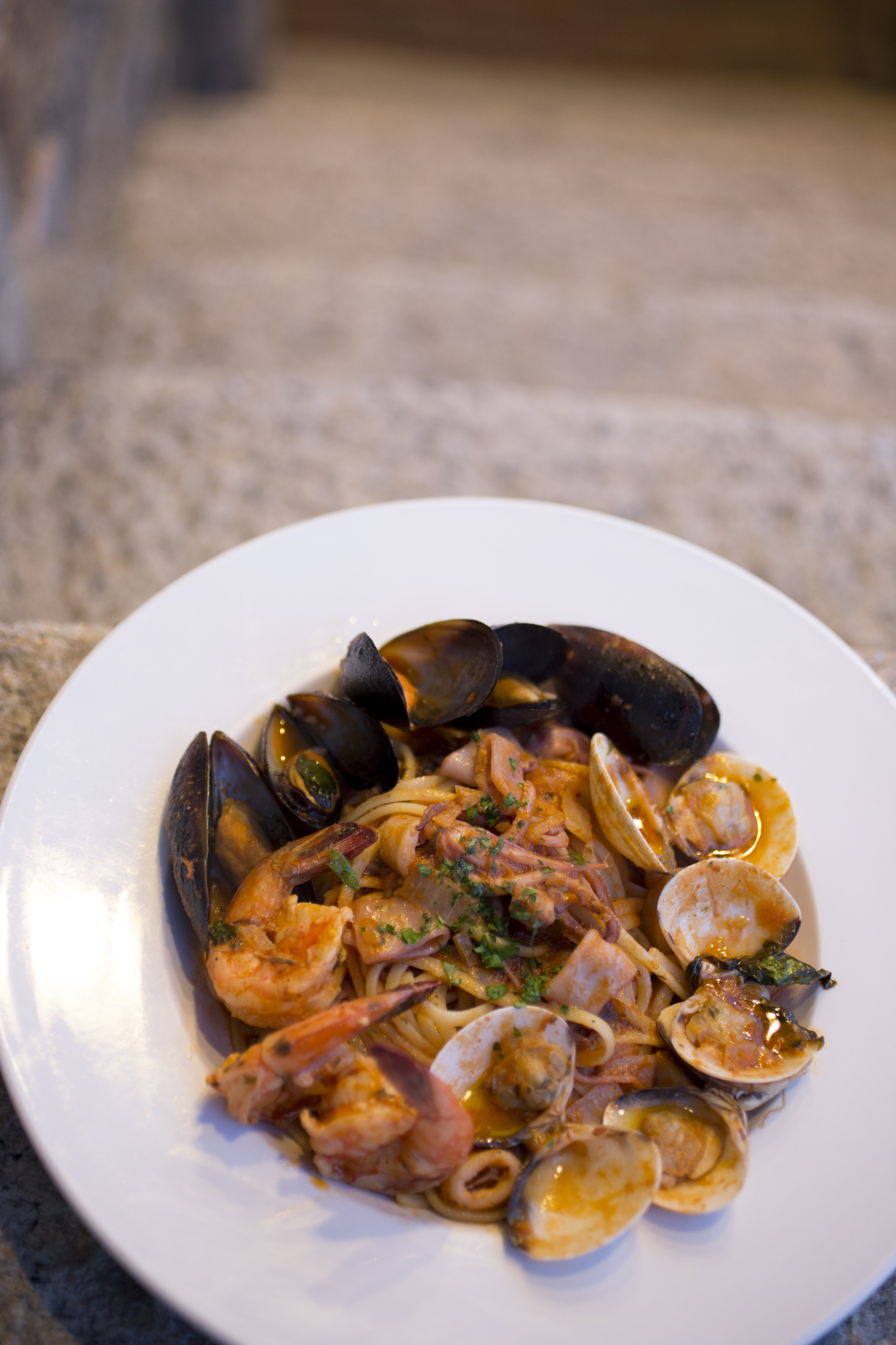 Linguine ai frutti di mare, with mussels, clams, calamari, and shrimp, is a signature dish at Trattoria Bar 89 Centrale.