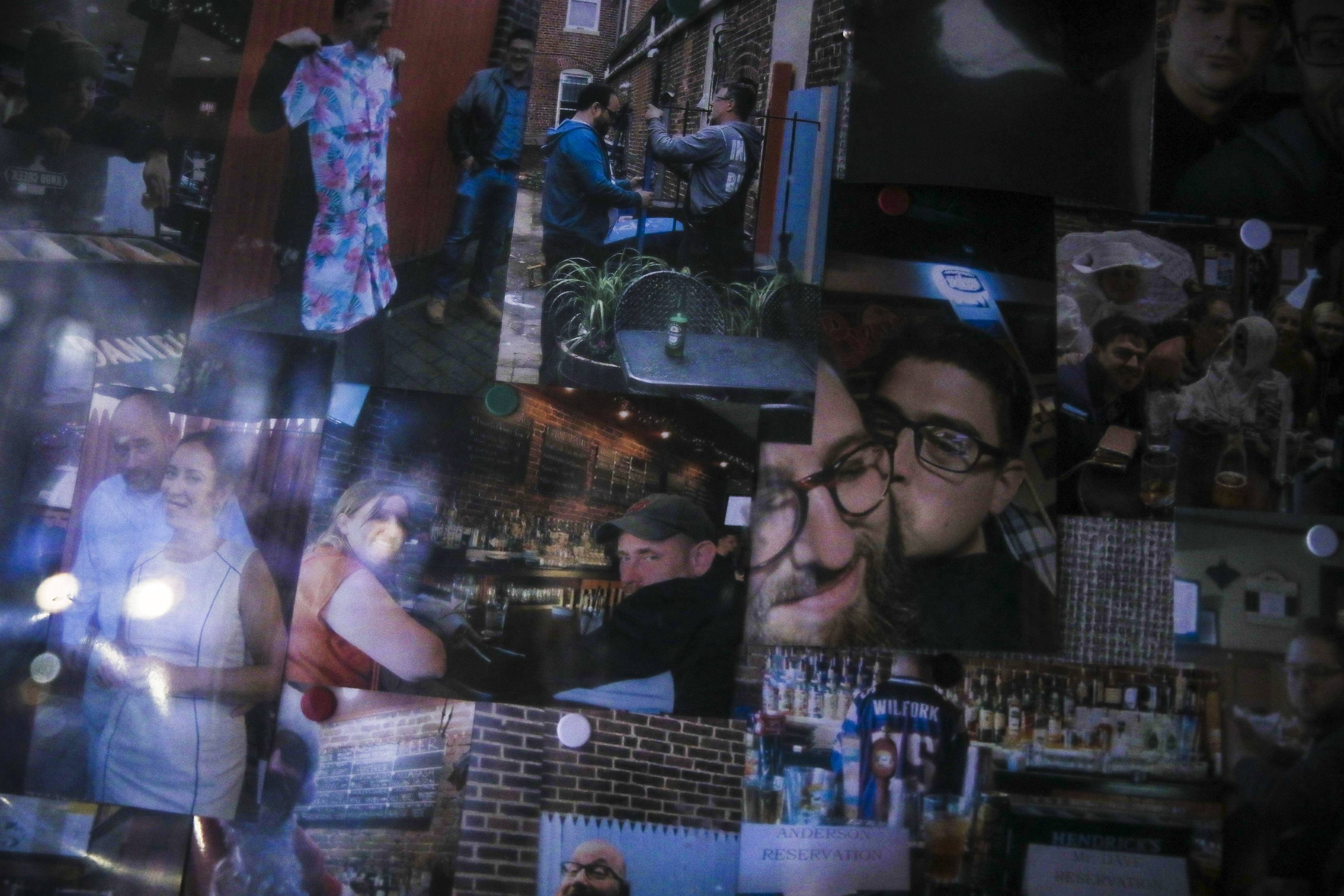 Photos of staff and regulars filled the board that normally was home to menus on the last night Common Ground was open.