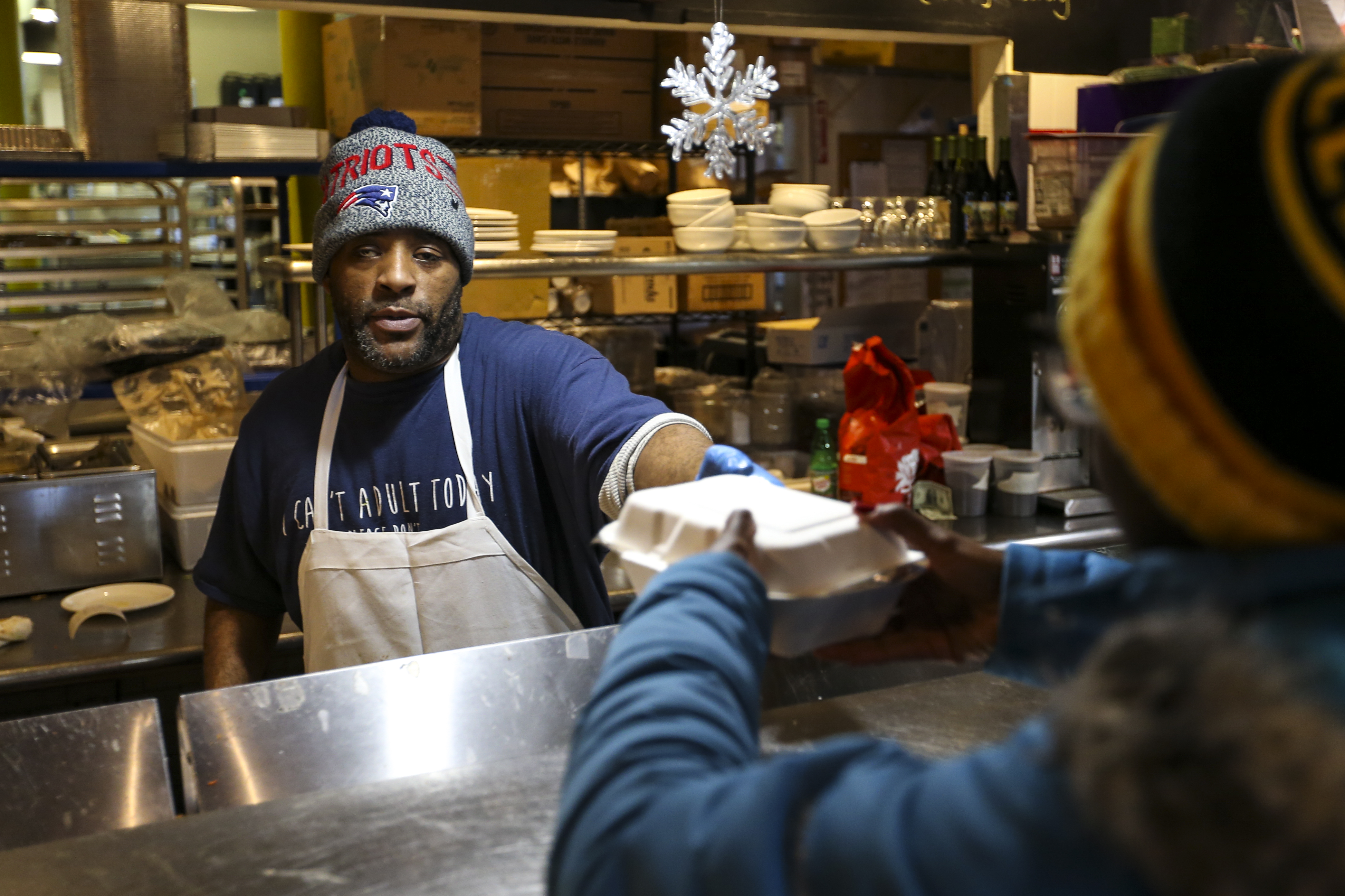 Calvin Adams served a customer on Friday at Haley House Bakery Café in Roxbury. Saturday will be the last day.