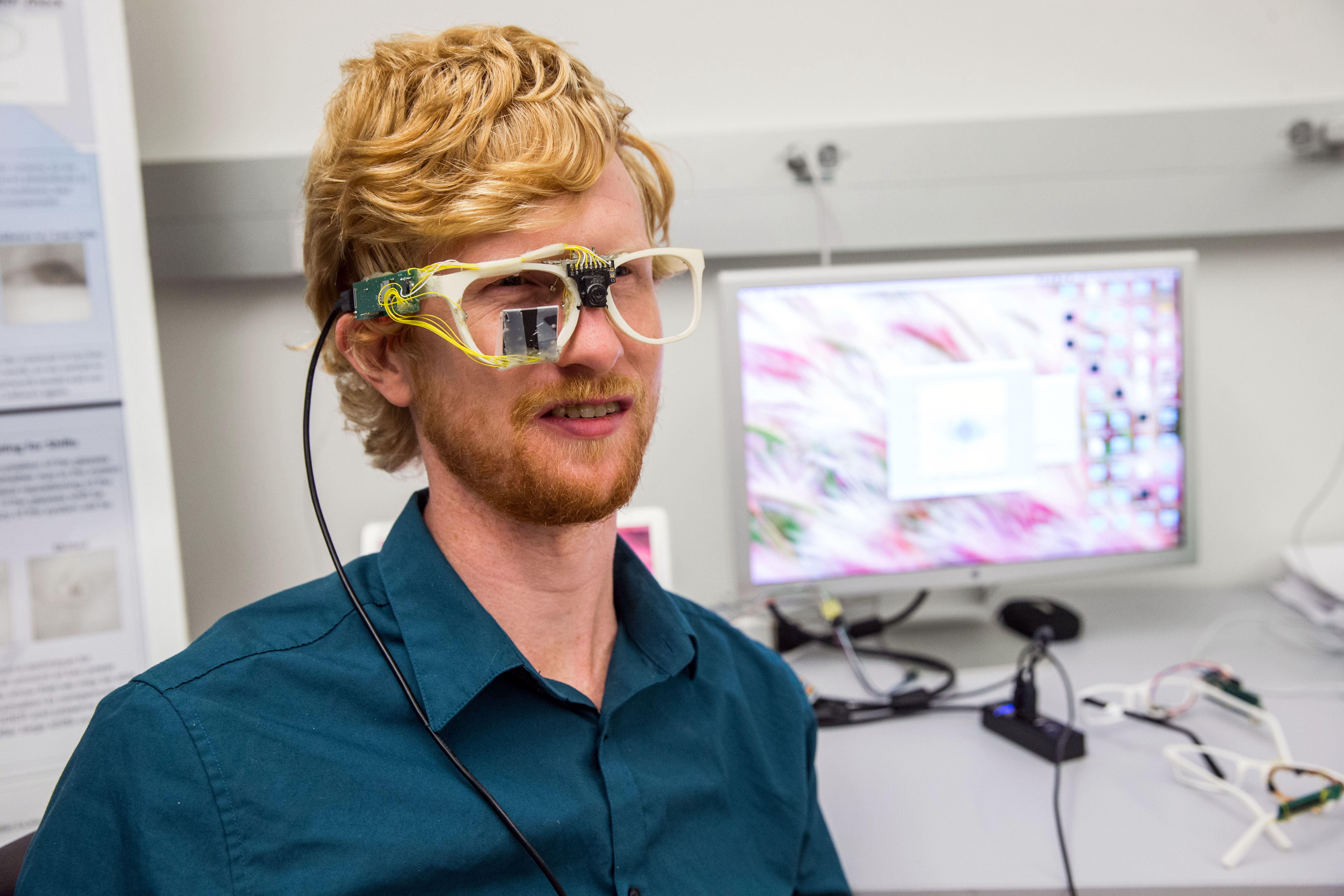 Student Addison Mayberry tried on glasses that capture eye movements.