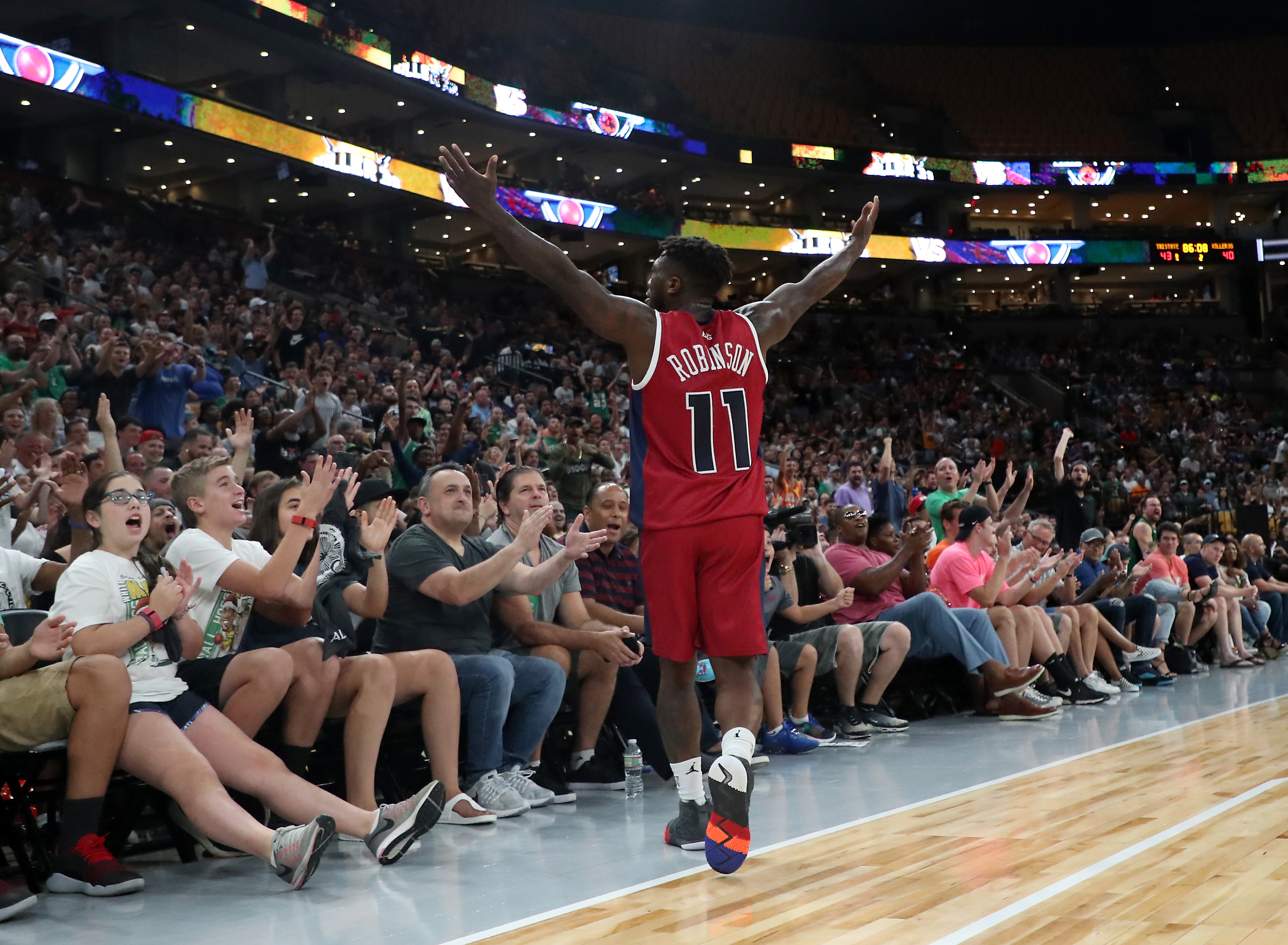 Former Celtic Nate Robinson, now of Tri State in the Big3, celebrates with the fans after they defeated the Killer 3s at TD Garden.