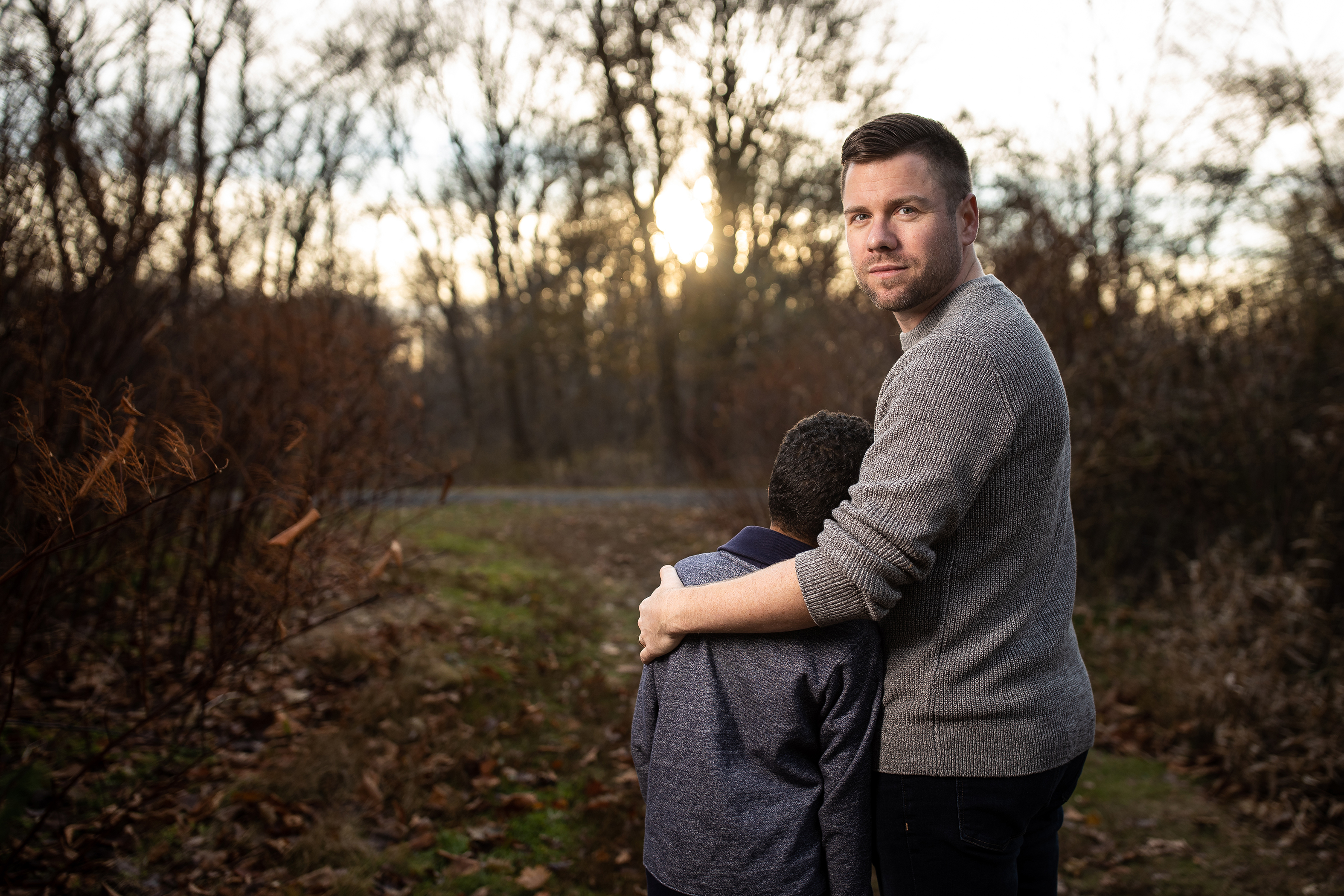 11/23/2019 MILTON, MA Author Calvin Hennick (cq) and his son Nile (cq) 8, at their home in Milton. **Note: family asked that nile not be recognizable in any photos.** (Aram Boghosian for The Boston Globe) For 12/8/19 magazine. DON'T USE BEFORE THIS APPEARS IN MAGAZINE.