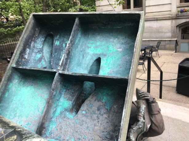 Officials believe the bronze statue fell over around 1 p.m.