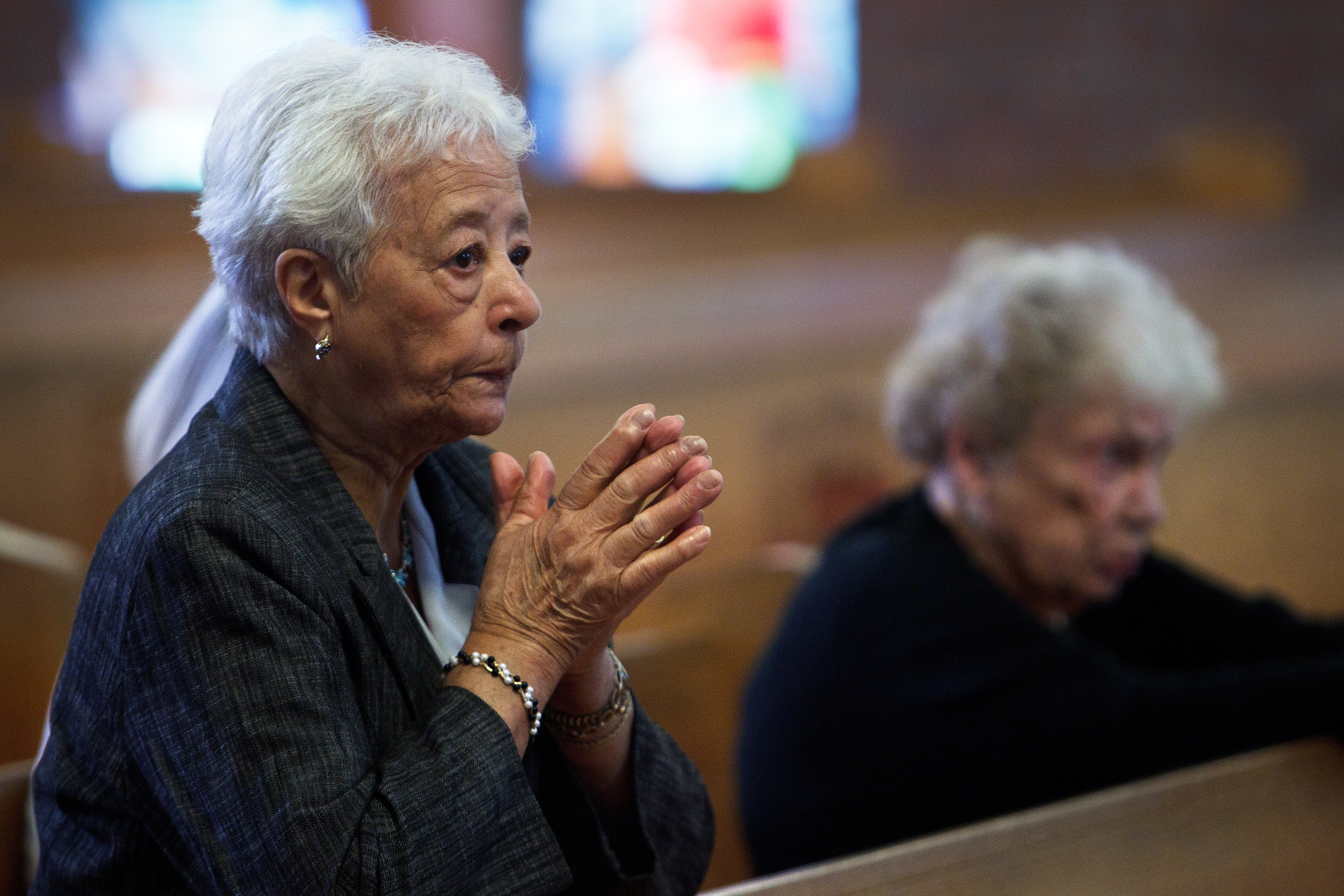 Mary Fernandes prayed inside St. Frances Xavier Cabrini Church.