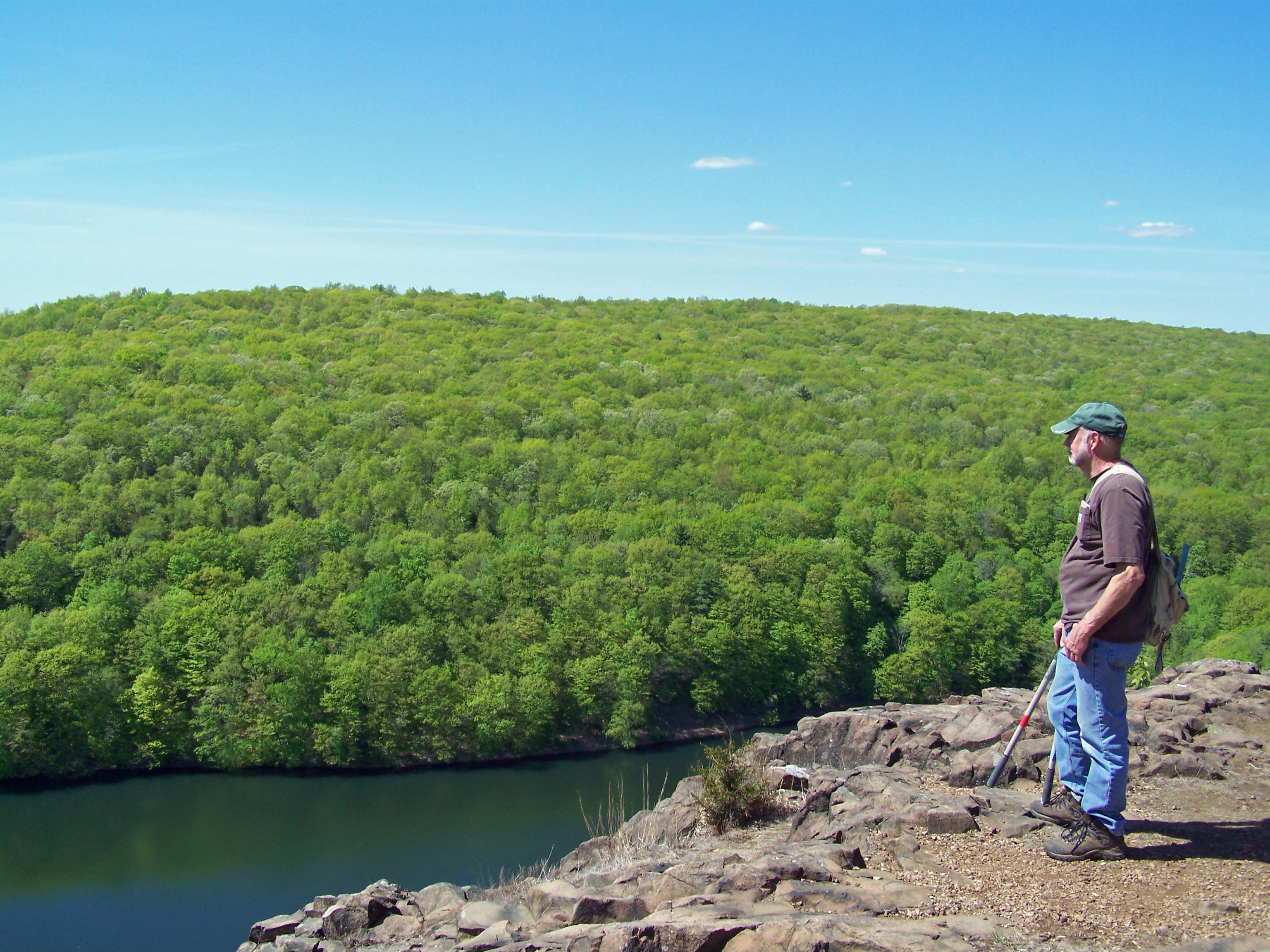 Trail maintenance volunteer Bob Nodine pauses to admire the beauty along the Mattabesett Trail.