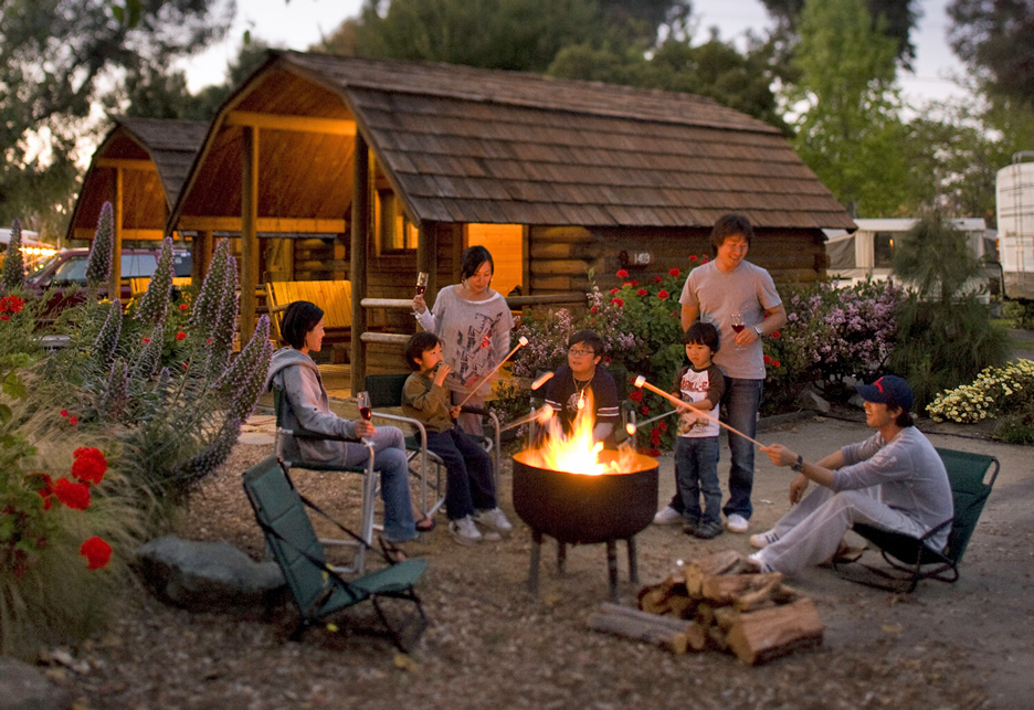 Whether you opt for a tent or a basic cabin, camping allows time to enjoy life's simpler pleasures, like making s'mores.