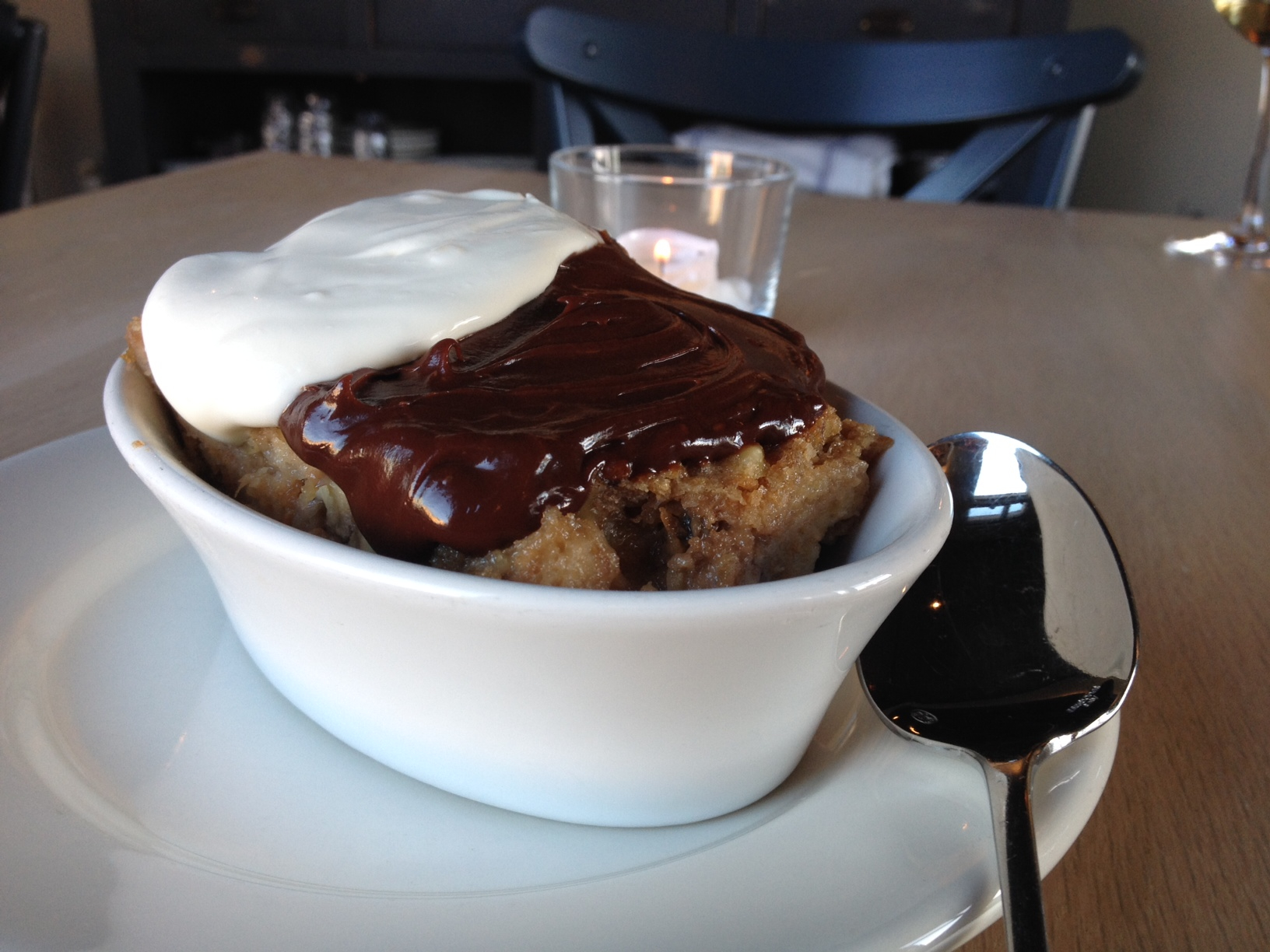 Banana bread pudding with cream and chocolate.