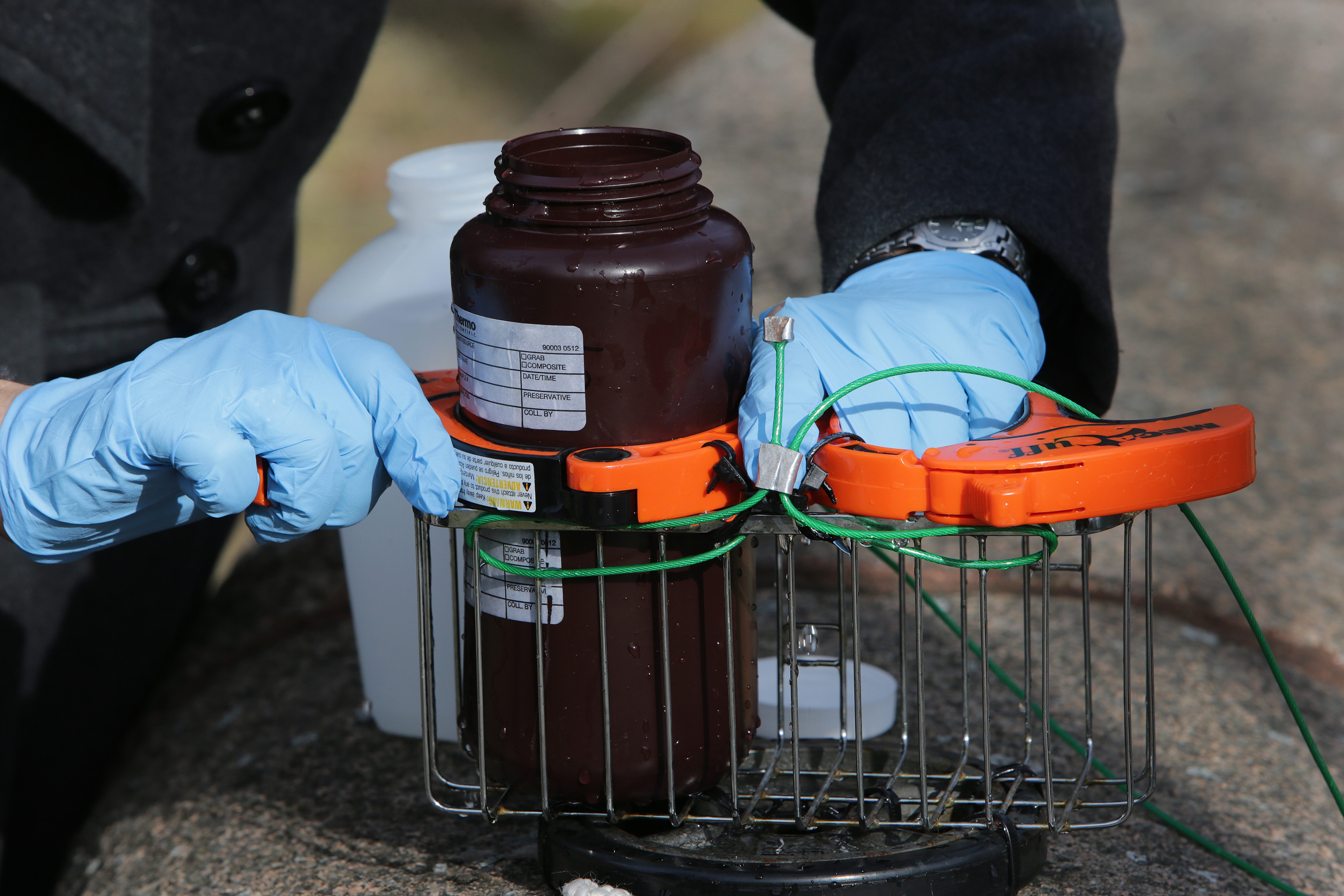 Elisabeth Cianciola, a scientist with the Charles River Watershed Association, drew water from Willow Pond for testing.