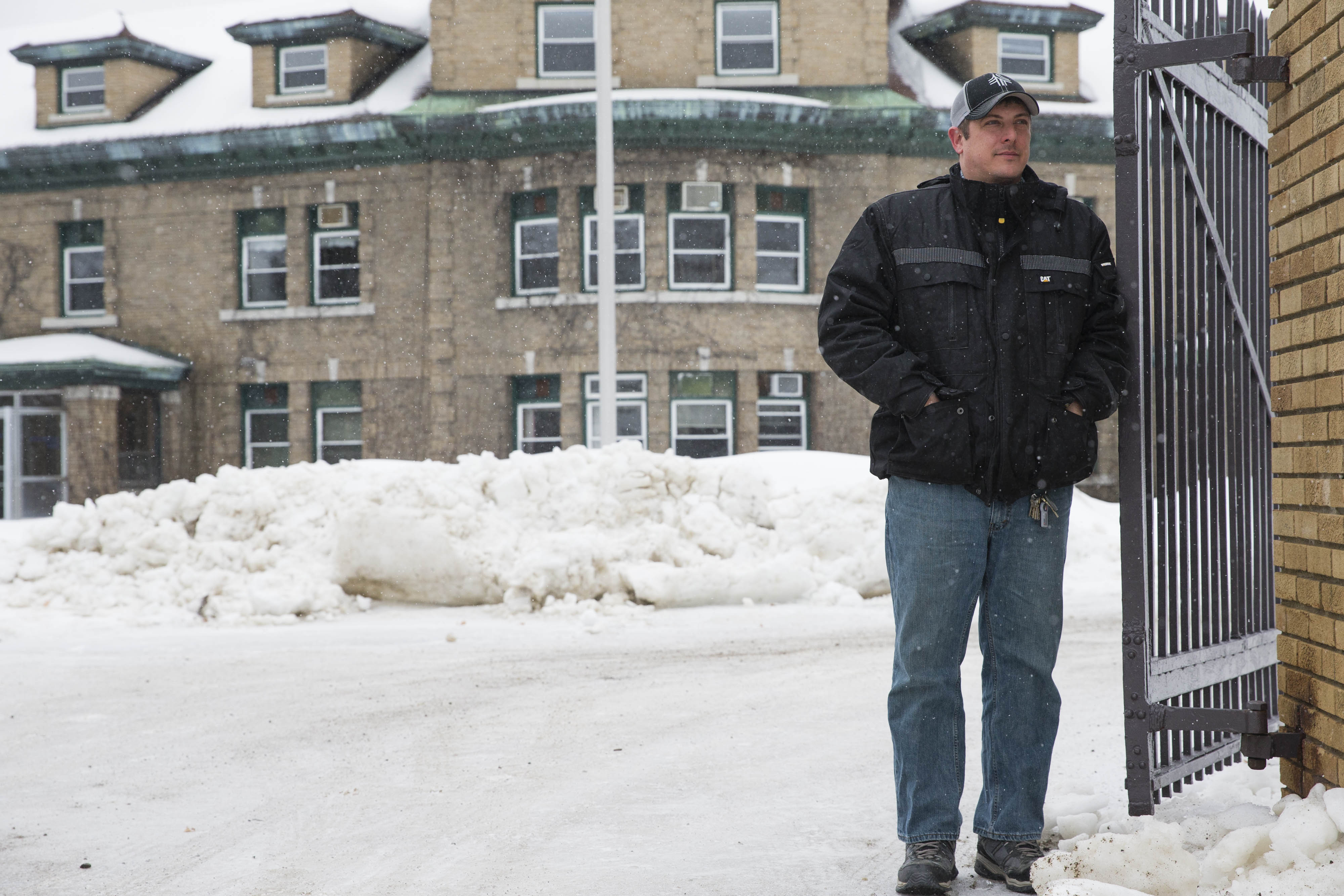 Mike Osborne, the vice president of community and economic redevelopment group Our Katahdin, stood in the driveway of the Great Norther Paper Mill.
