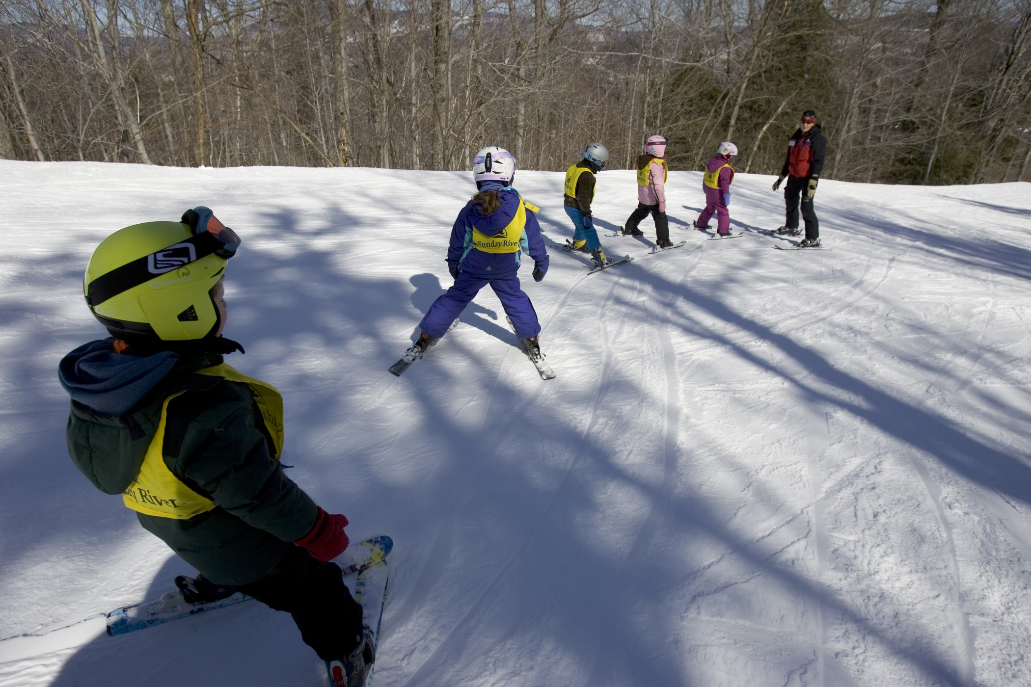 Young people learned to ski at Sunday River.