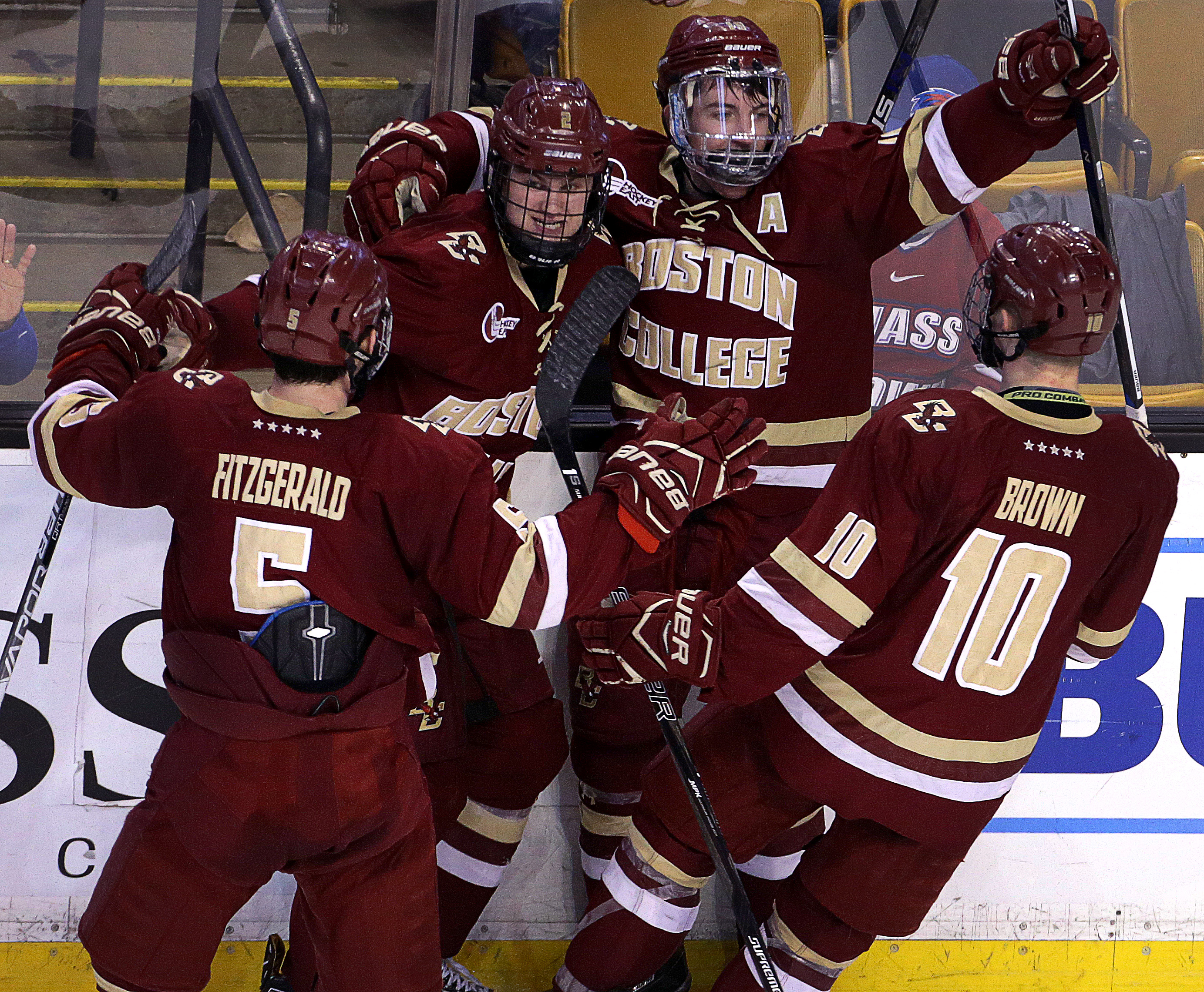 BC’s Ryan Fitzgerald (19) celebrates with his teammates after scoring in the second period against BU.