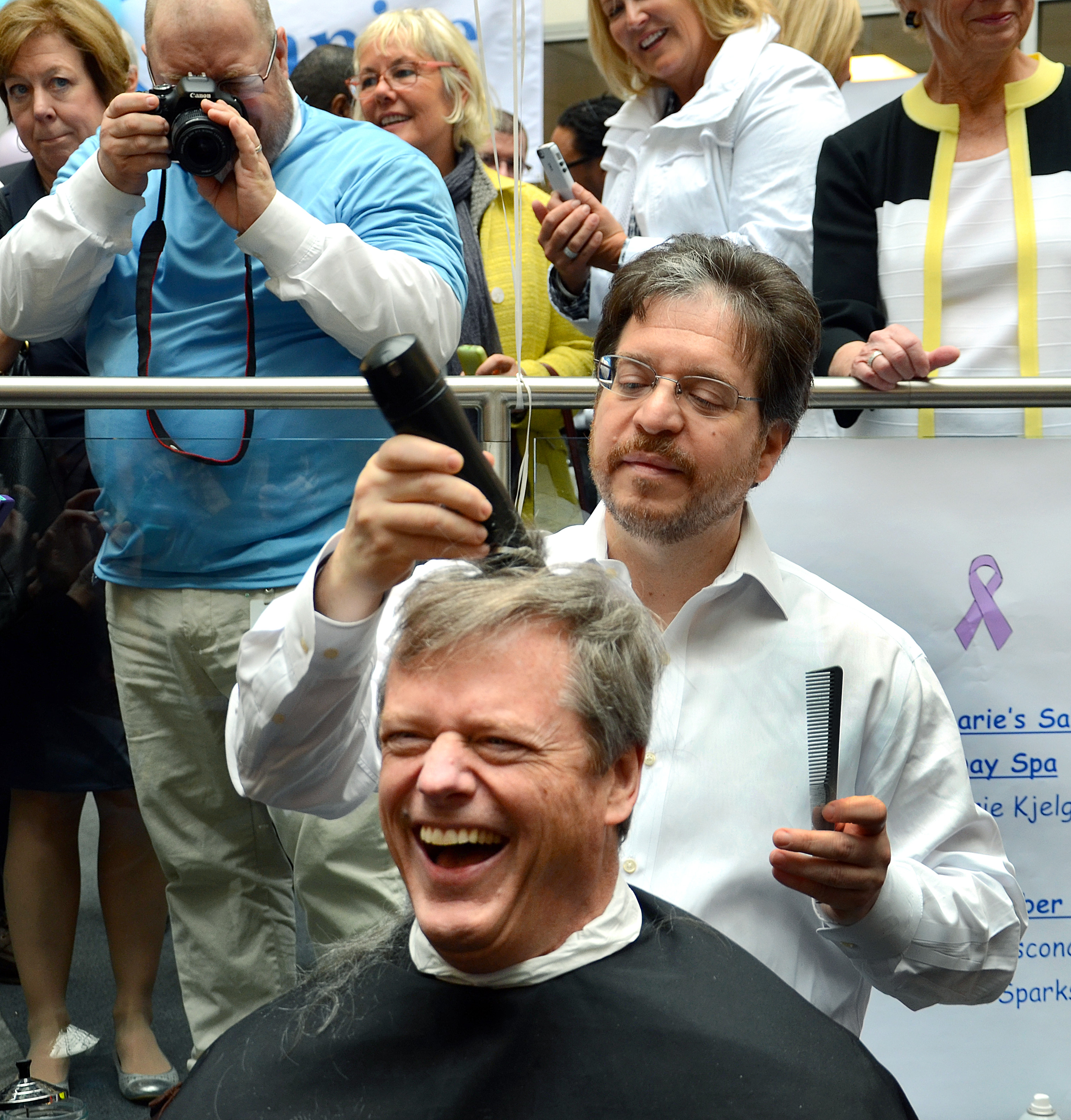 Baker got his hair buzzed by barber Philip Boncaldo.