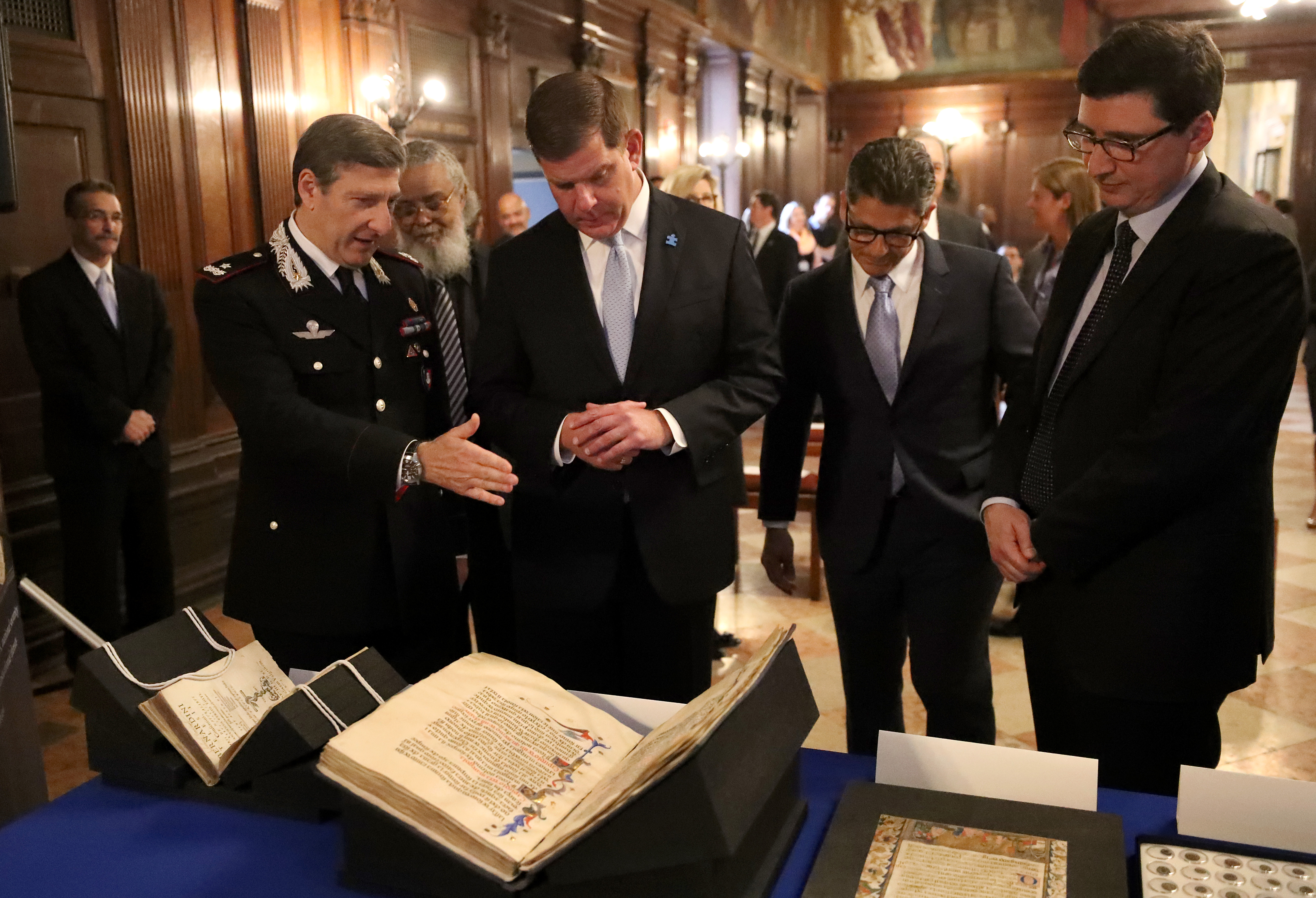 A repatriation ceremony with (left to right) : Brigadier General Fabrizio Parrulli, Carabinieri Commander for the Protection of Cultural Heritage, Mayor Martin J. Walsh, Matthew Etre, Special Agent in Charge at DHS-ICE Homeland Security Investigations and Nicola De Santis Consul General of Italy Boston.